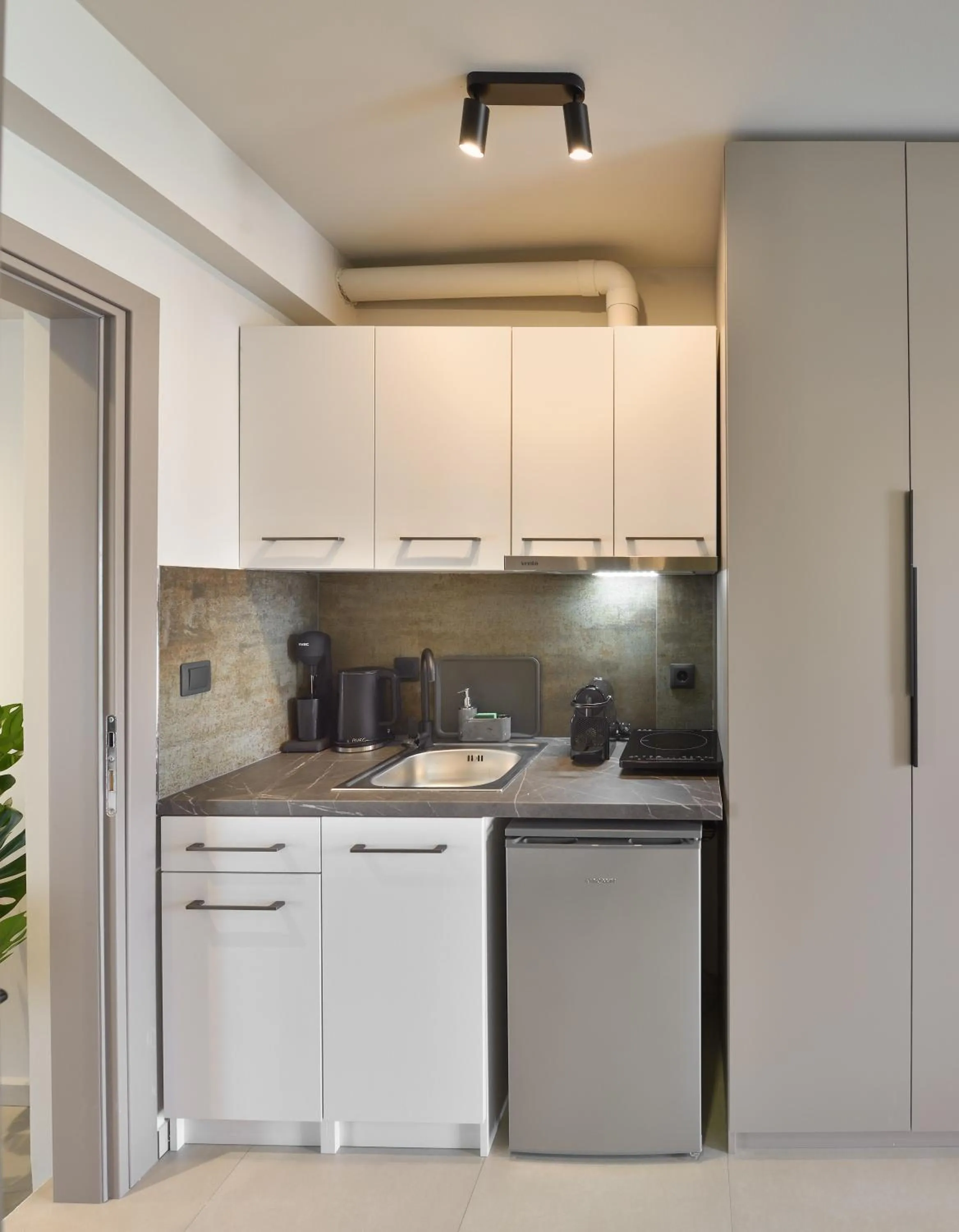 Kitchen or kitchenette in Olive All-Seasons Suites, Panel Hospitality Homes & Villas
