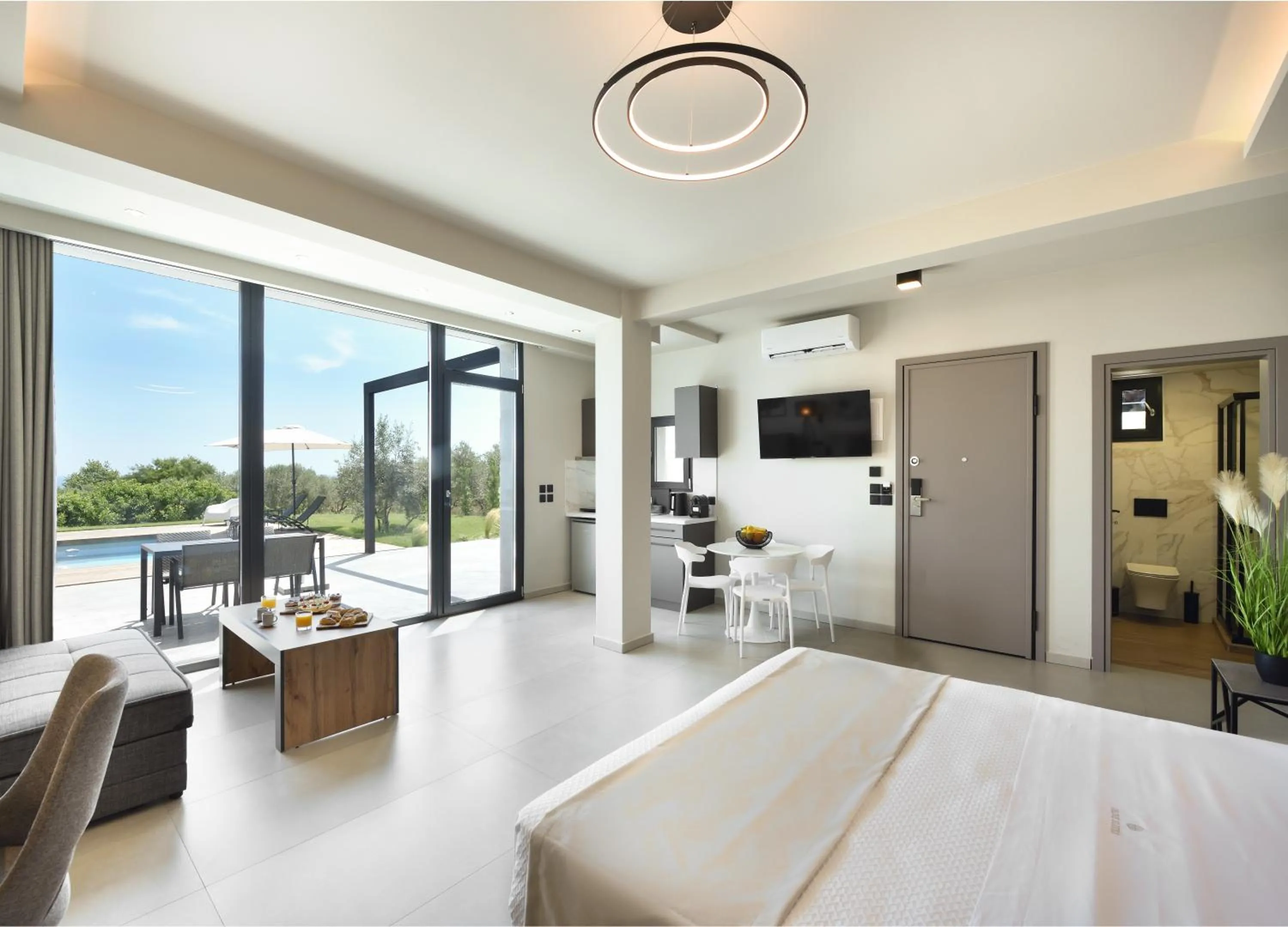 Photo of the whole room, Bed in Olive All-Seasons Suites, Panel Hospitality Homes & Villas