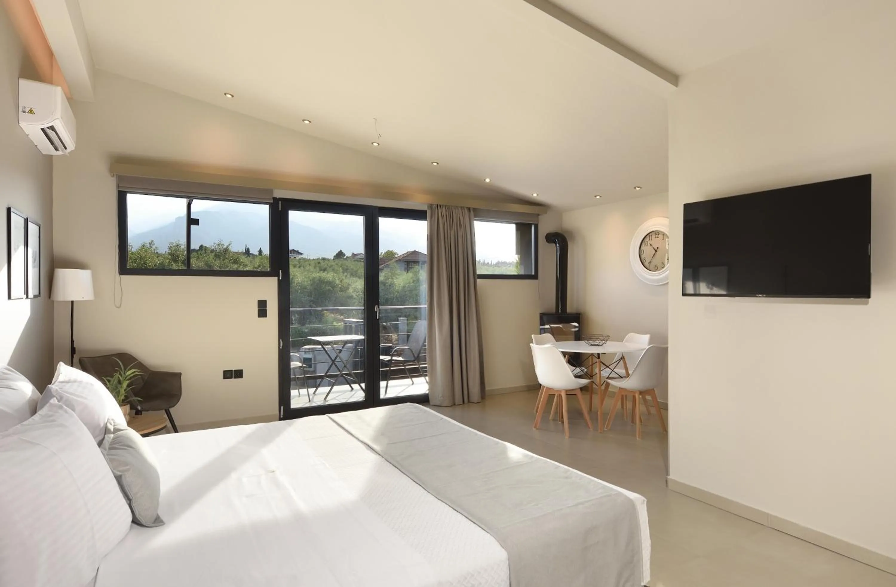 TV and multimedia, Bed in Olive All-Seasons Suites, Panel Hospitality Homes & Villas