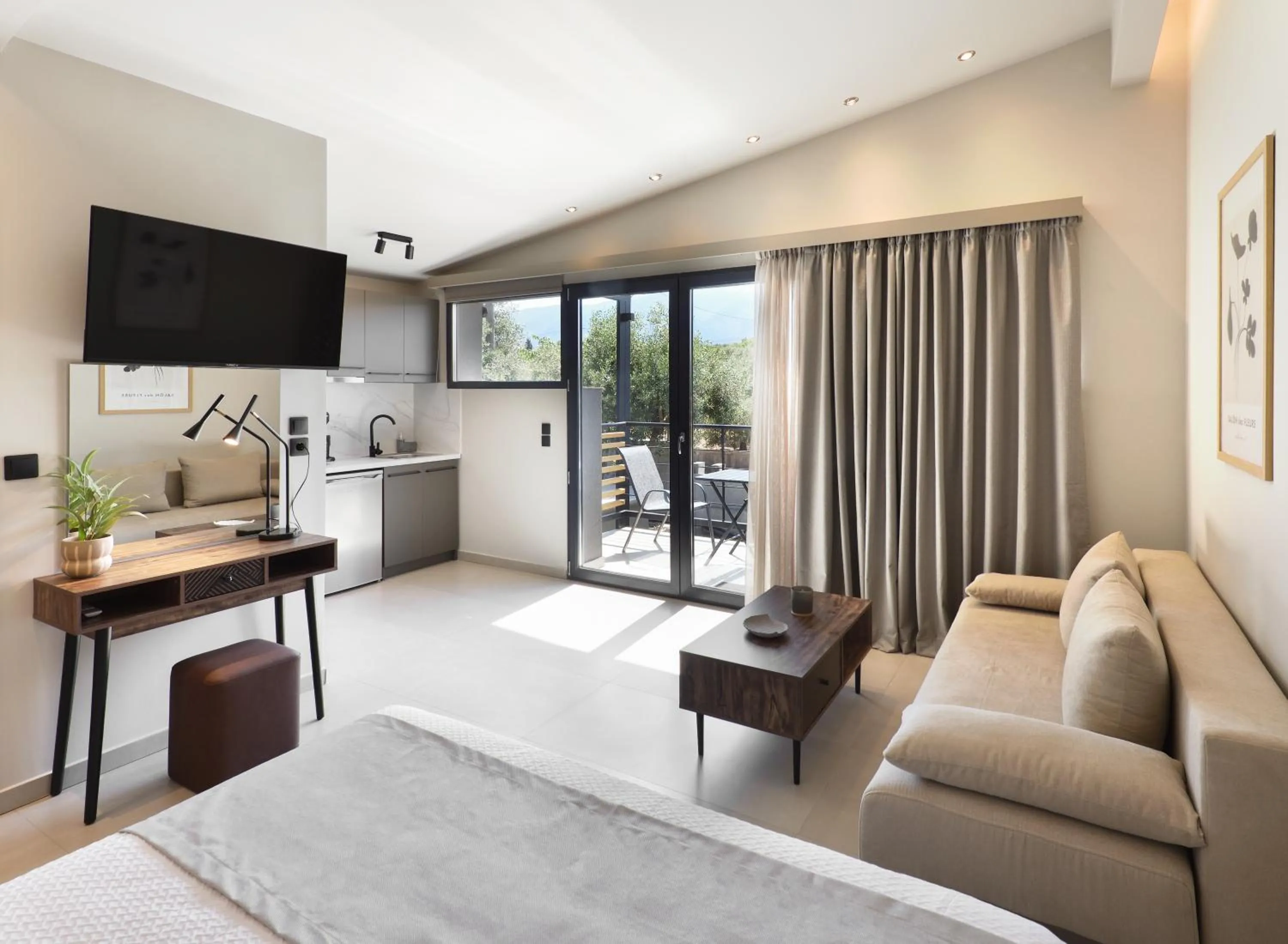 TV and multimedia in Olive All-Seasons Suites, Panel Hospitality Homes & Villas