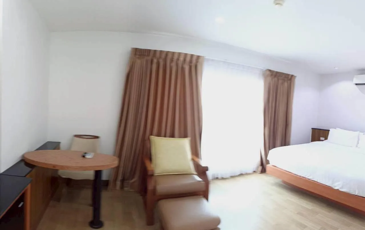 Bed in Cozy Donmueang Hotel