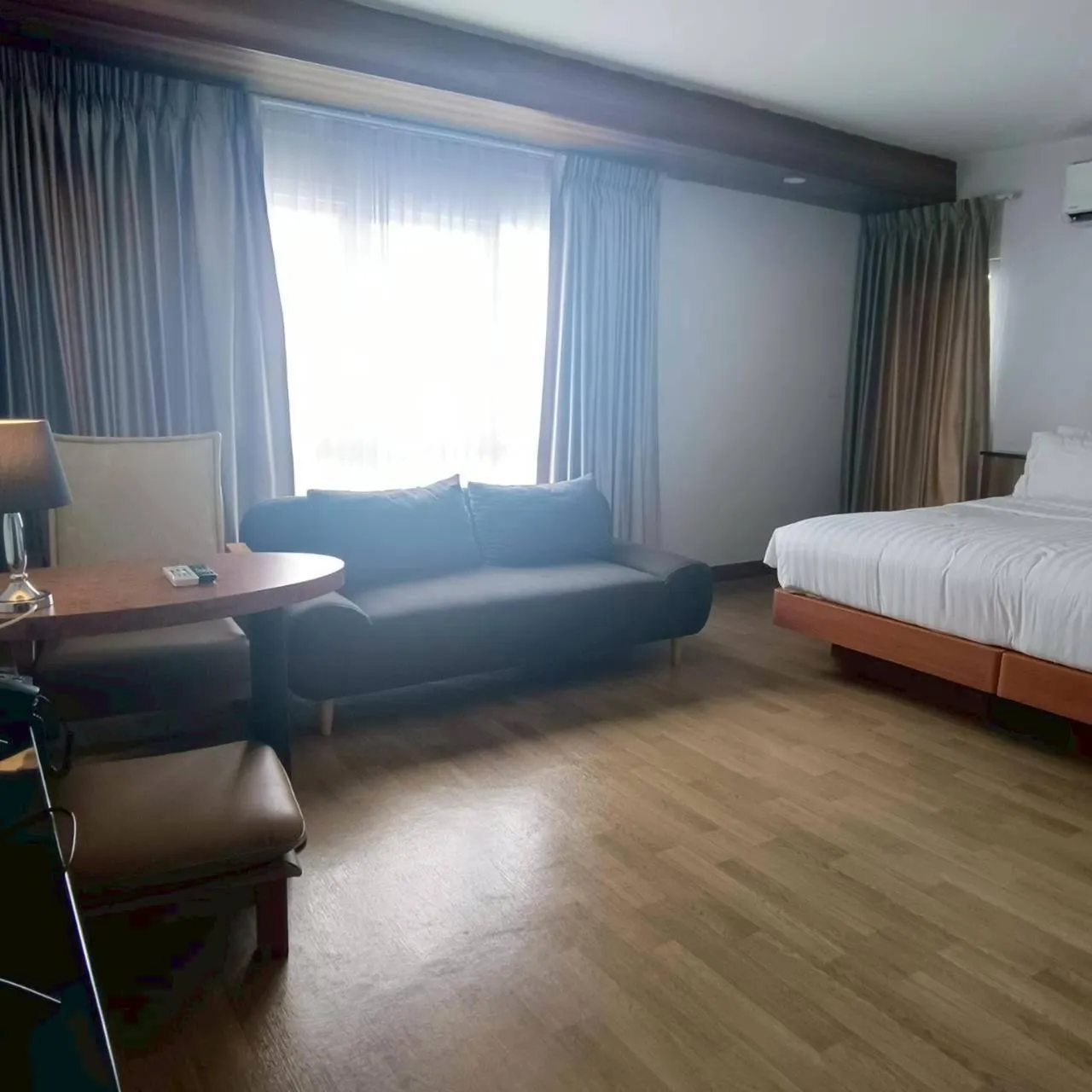 Bed in Cozy Donmueang Hotel