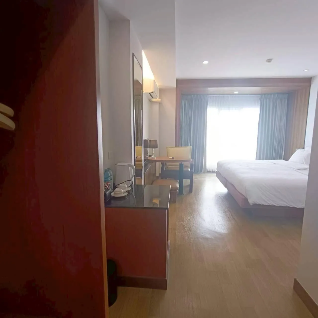 Bed in Cozy Donmueang Hotel