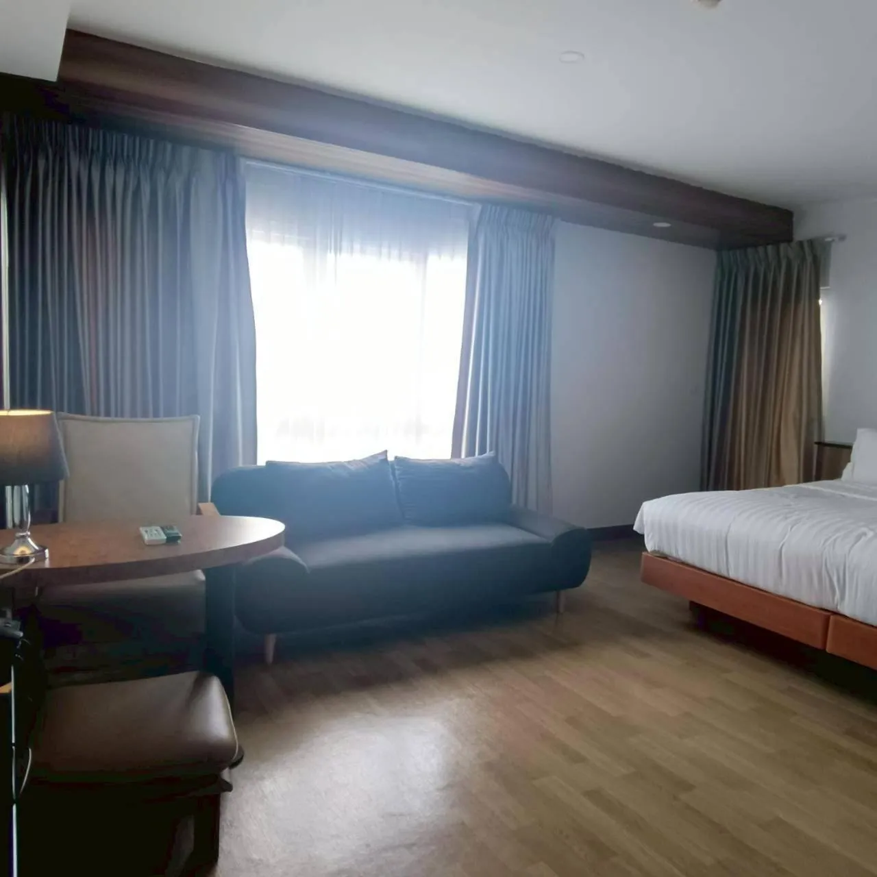 Bed in Cozy Donmueang Hotel