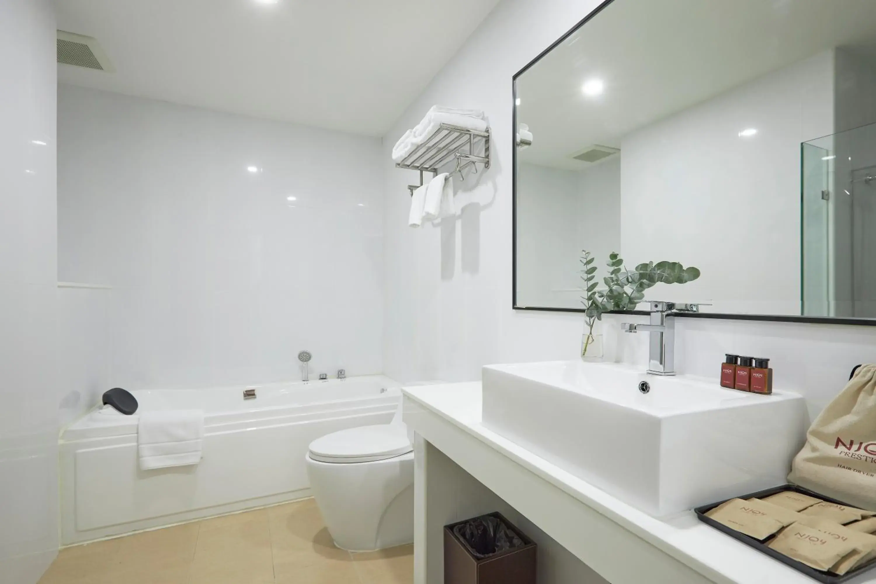 Bathroom in NJOY Prestige Grand Hotel Don Mueang Bathroom in NJOY Prestige Grand Hotel Don Mueang