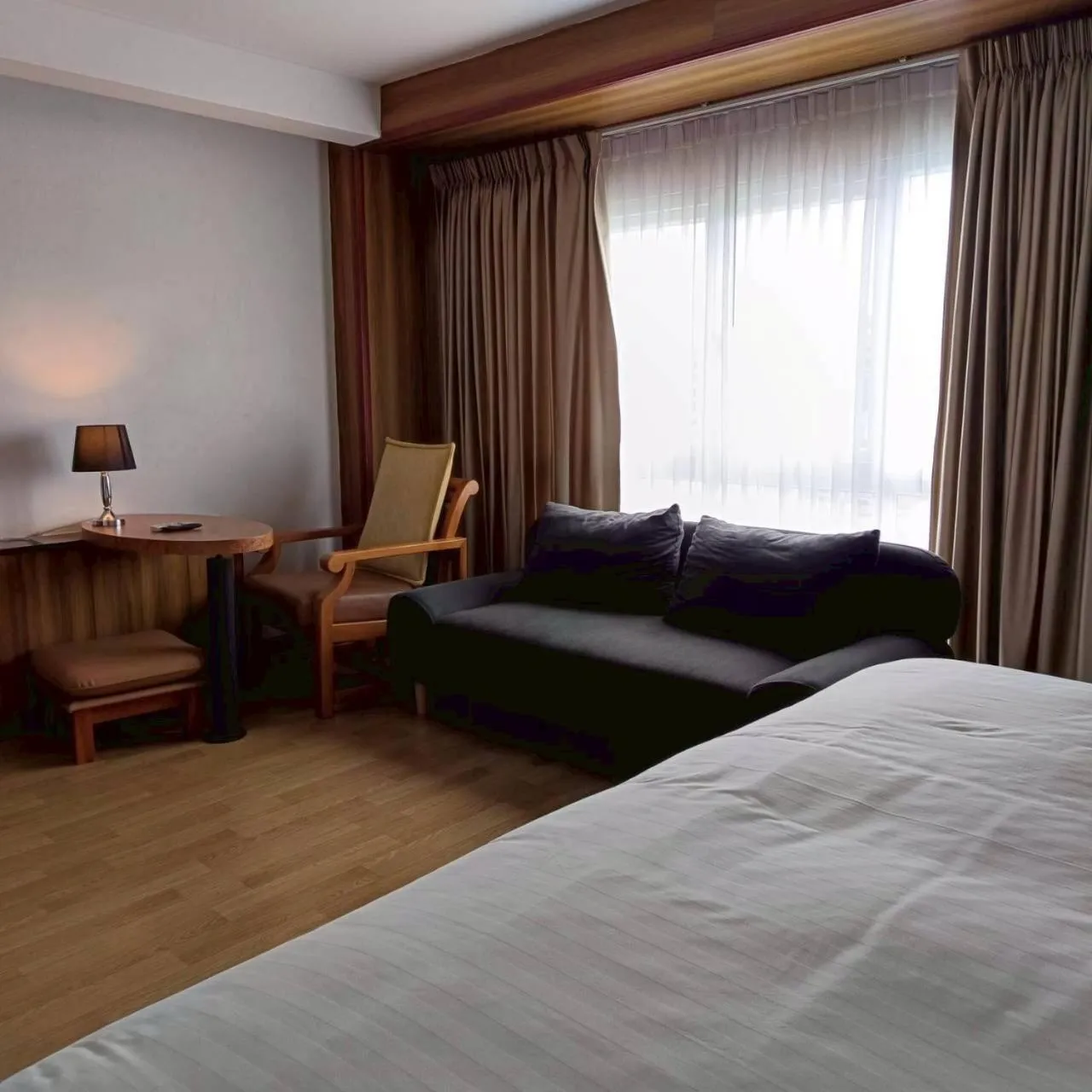 Bed in Cozy Donmueang Hotel