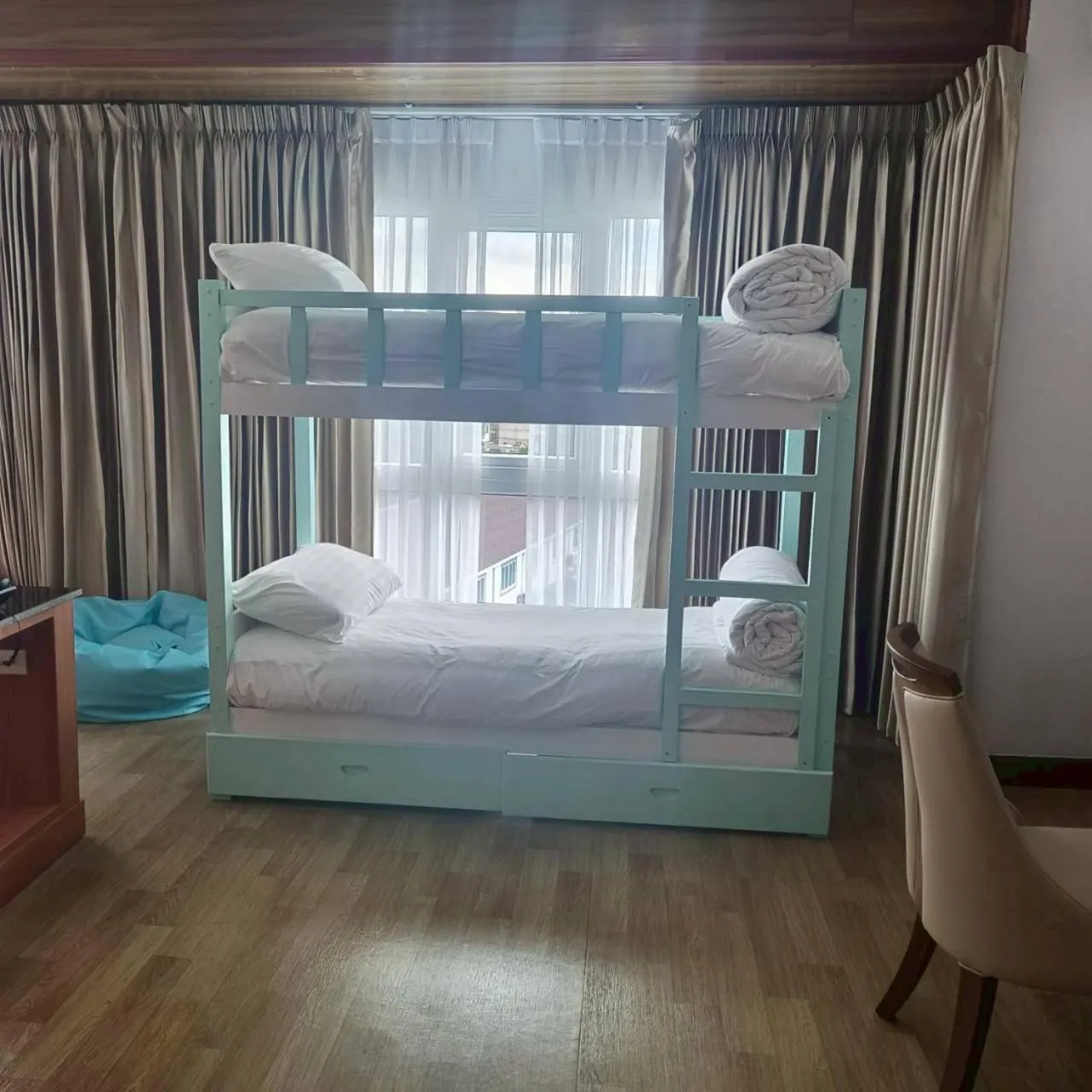 Bed in Cozy Donmueang Hotel