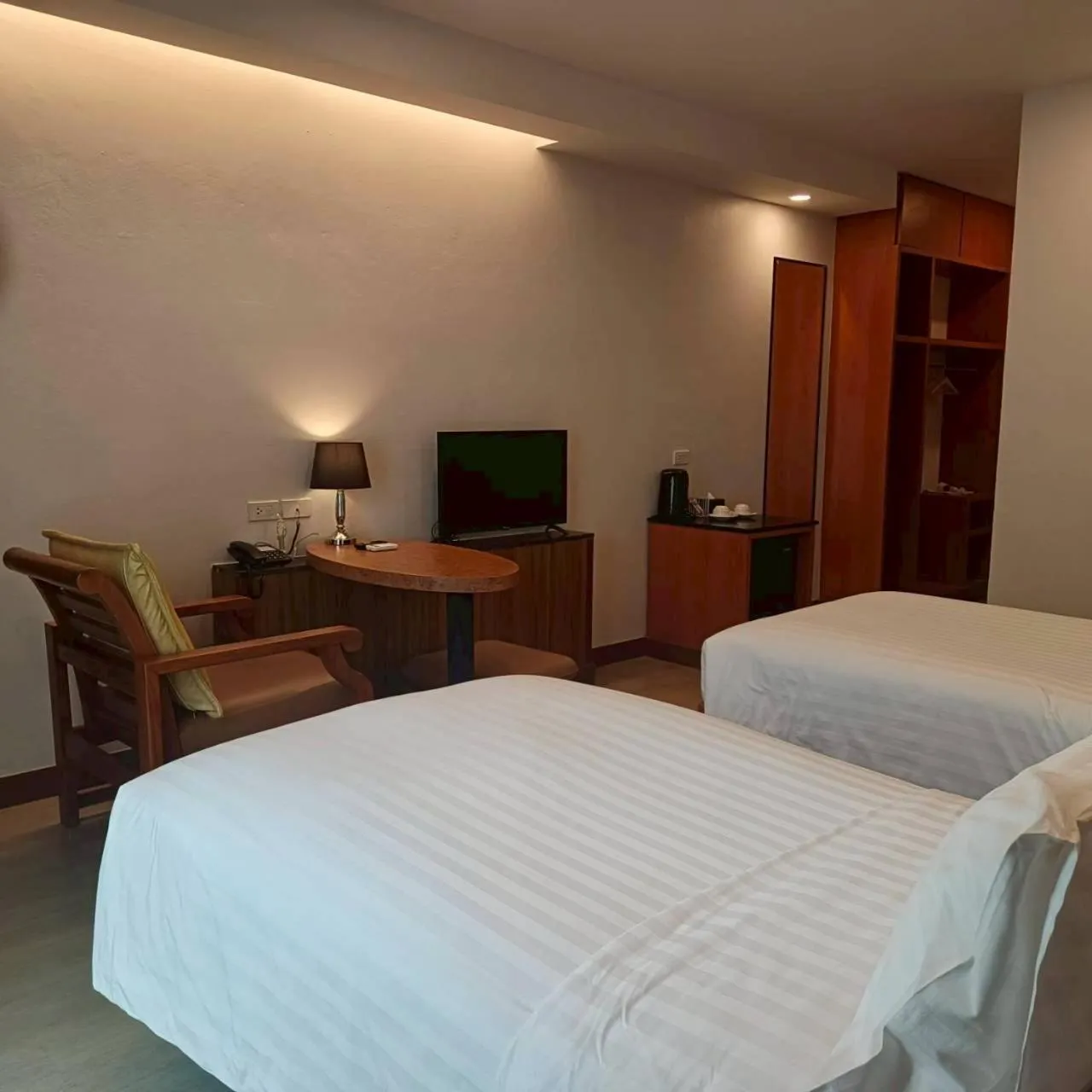 Bed in Cozy Donmueang Hotel