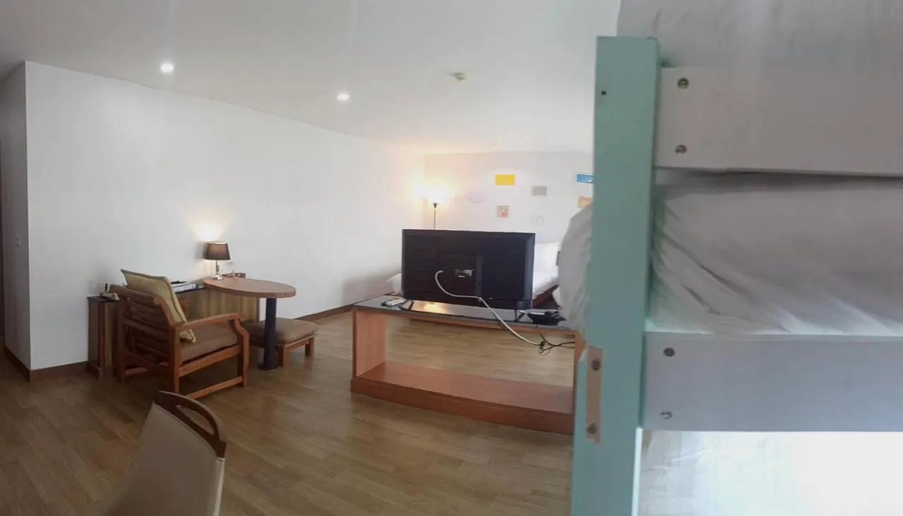 Bed in Cozy Donmueang Hotel