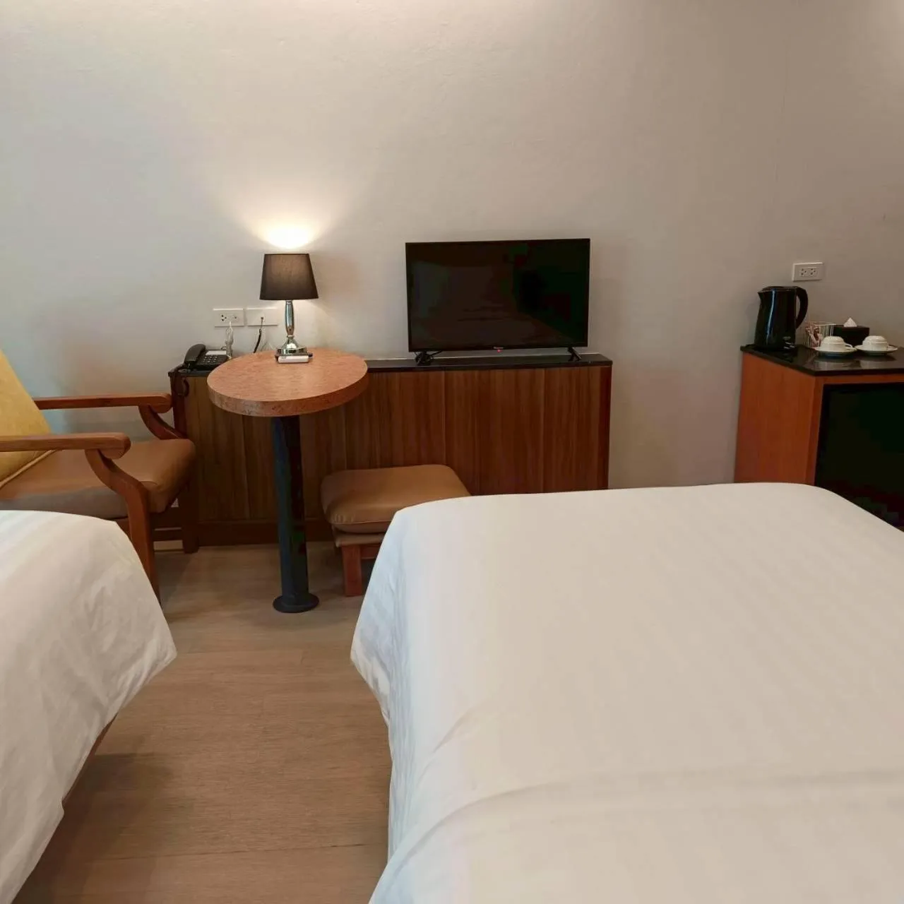 Bed in Cozy Donmueang Hotel