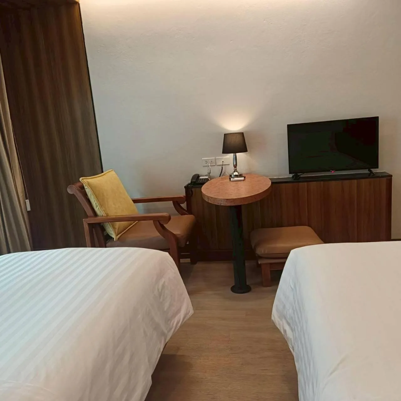 Bed in Cozy Donmueang Hotel