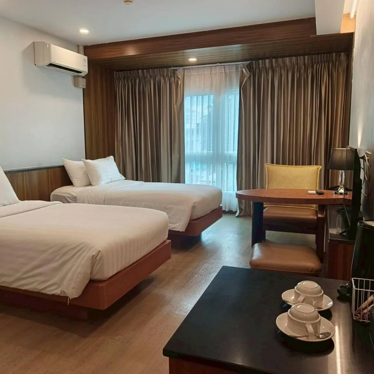 Bed in Cozy Donmueang Hotel
