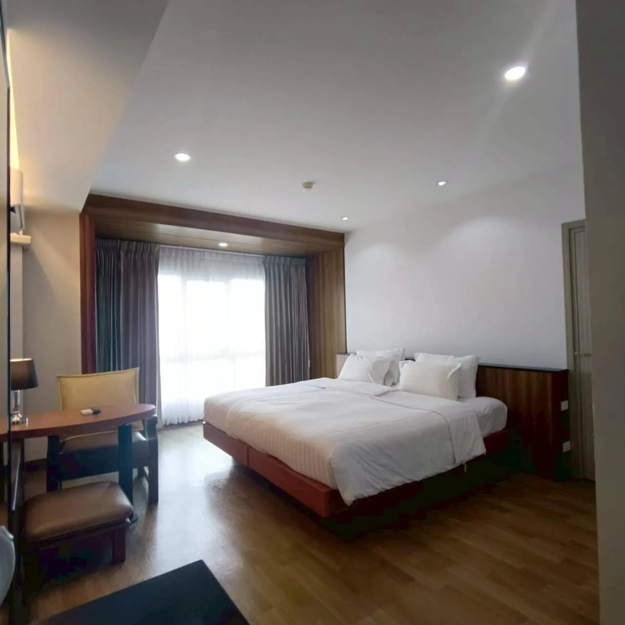 Bed in Cozy Donmueang Hotel