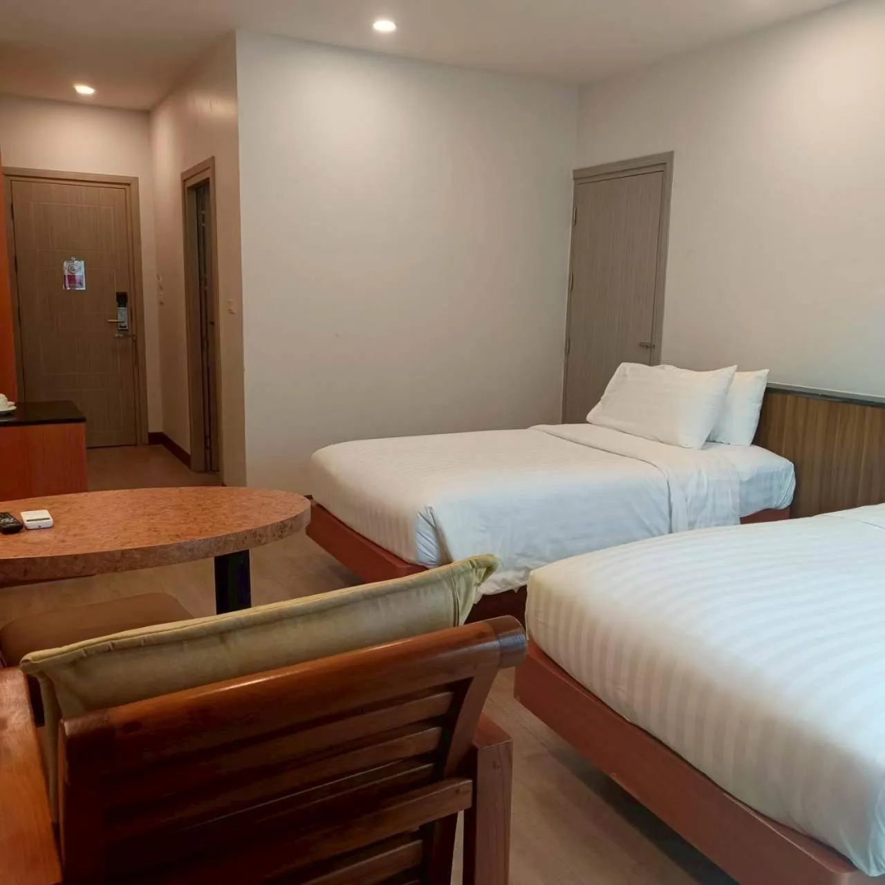 Bed in Cozy Donmueang Hotel