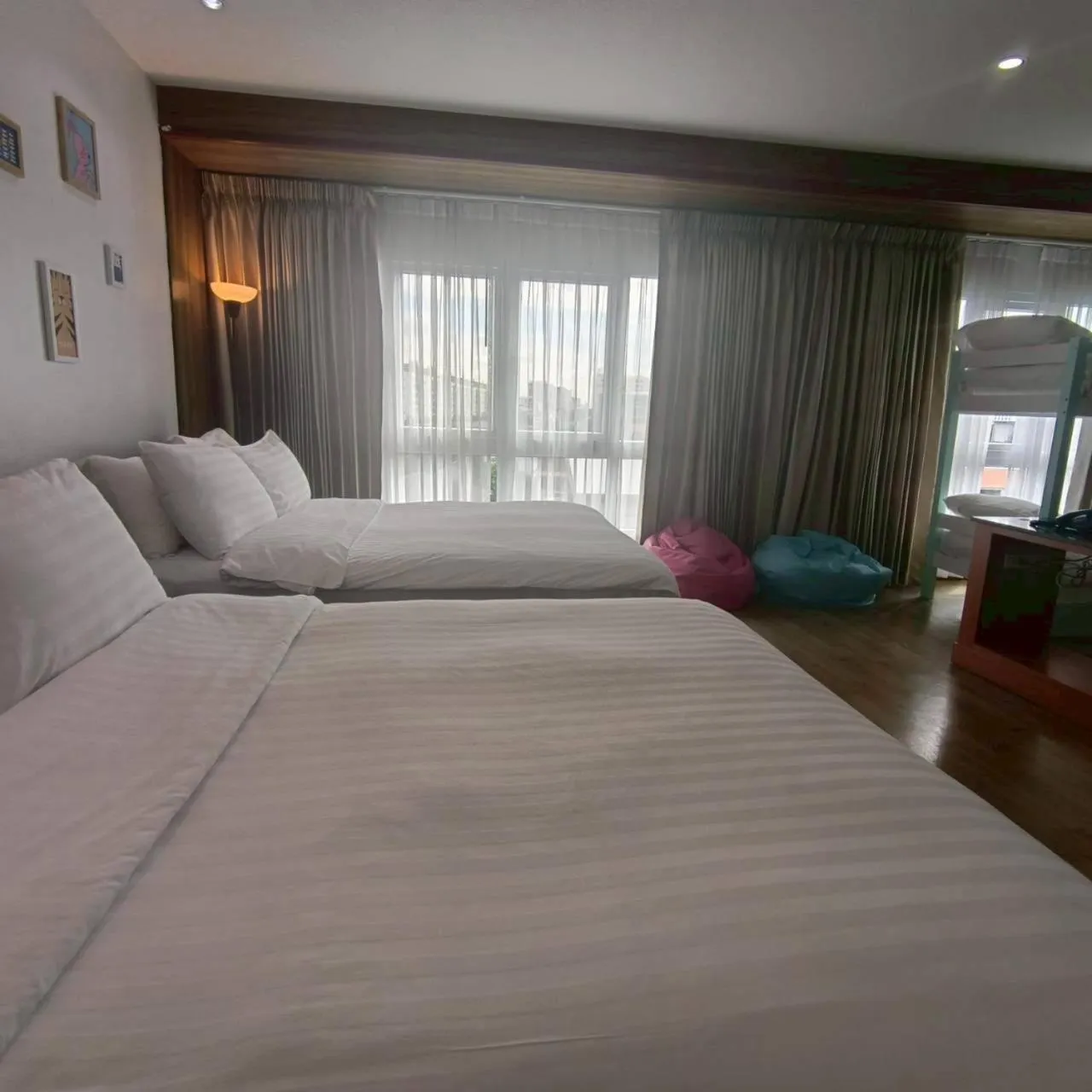 Bed in Cozy Donmueang Hotel