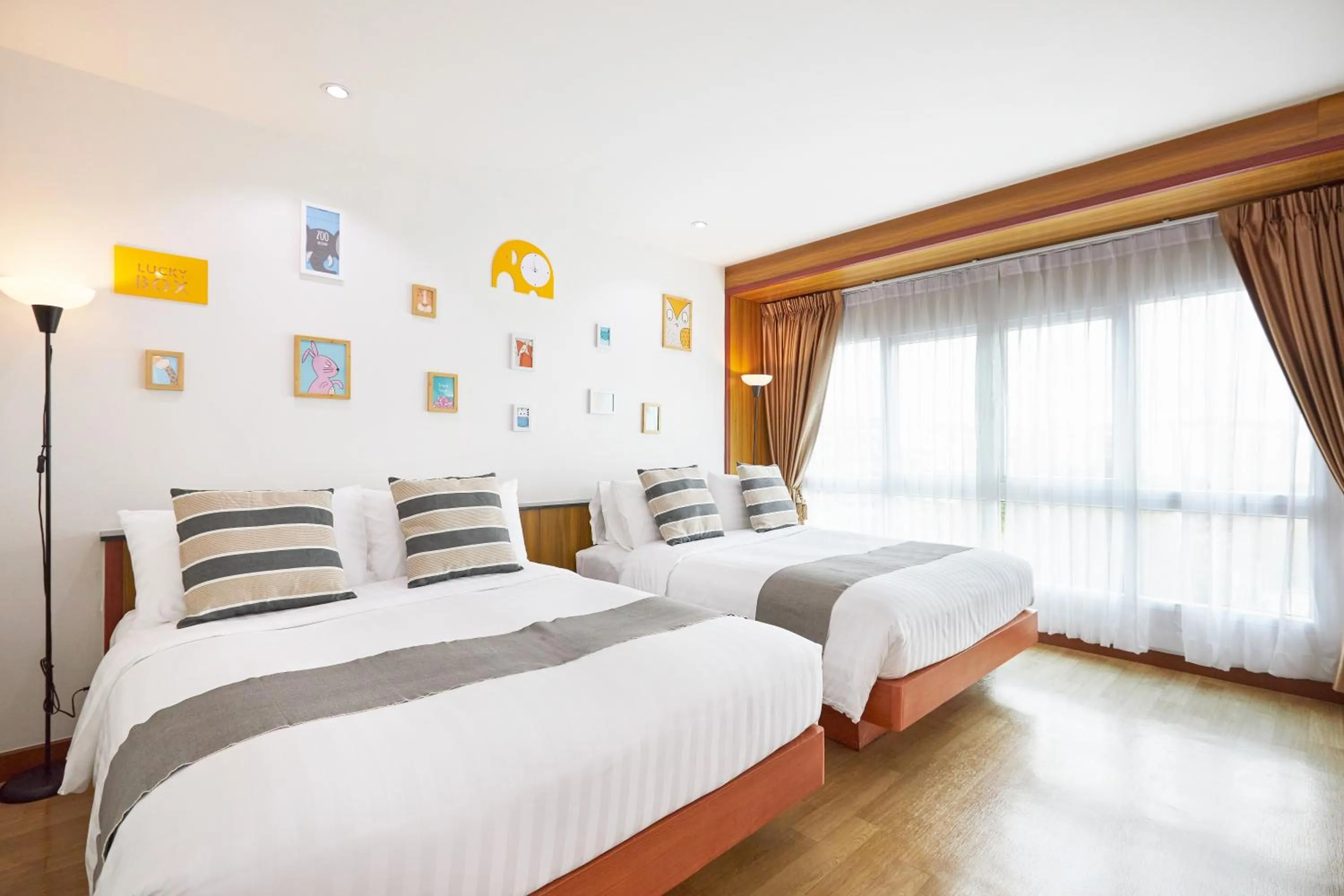 Bed in NJOY Prestige Grand Hotel Don Mueang