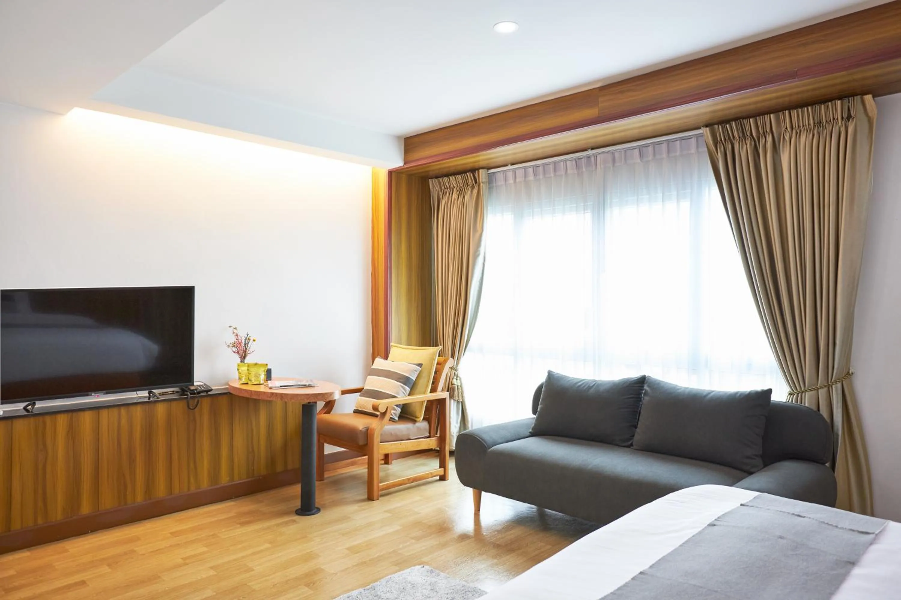 Bedroom in NJOY Prestige Grand Hotel Don Mueang
