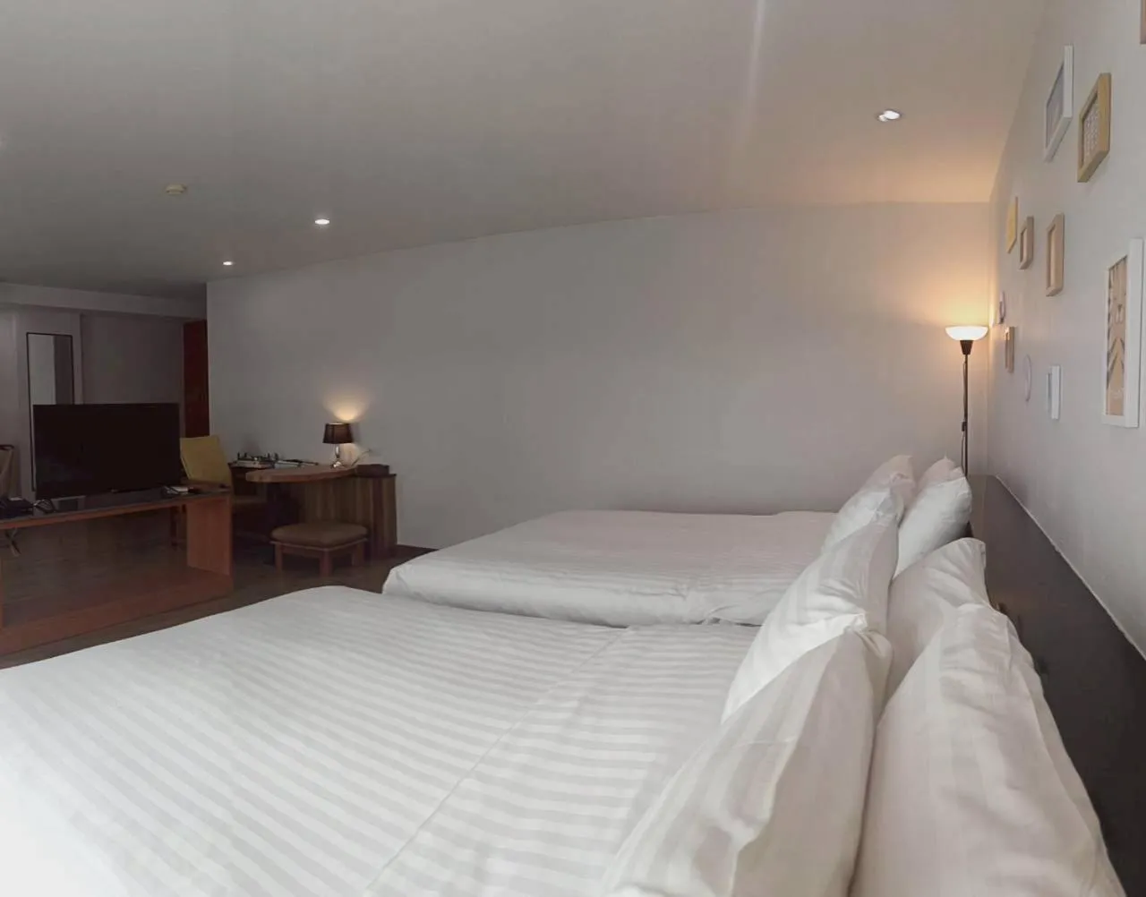 Bed in Cozy Donmueang Hotel