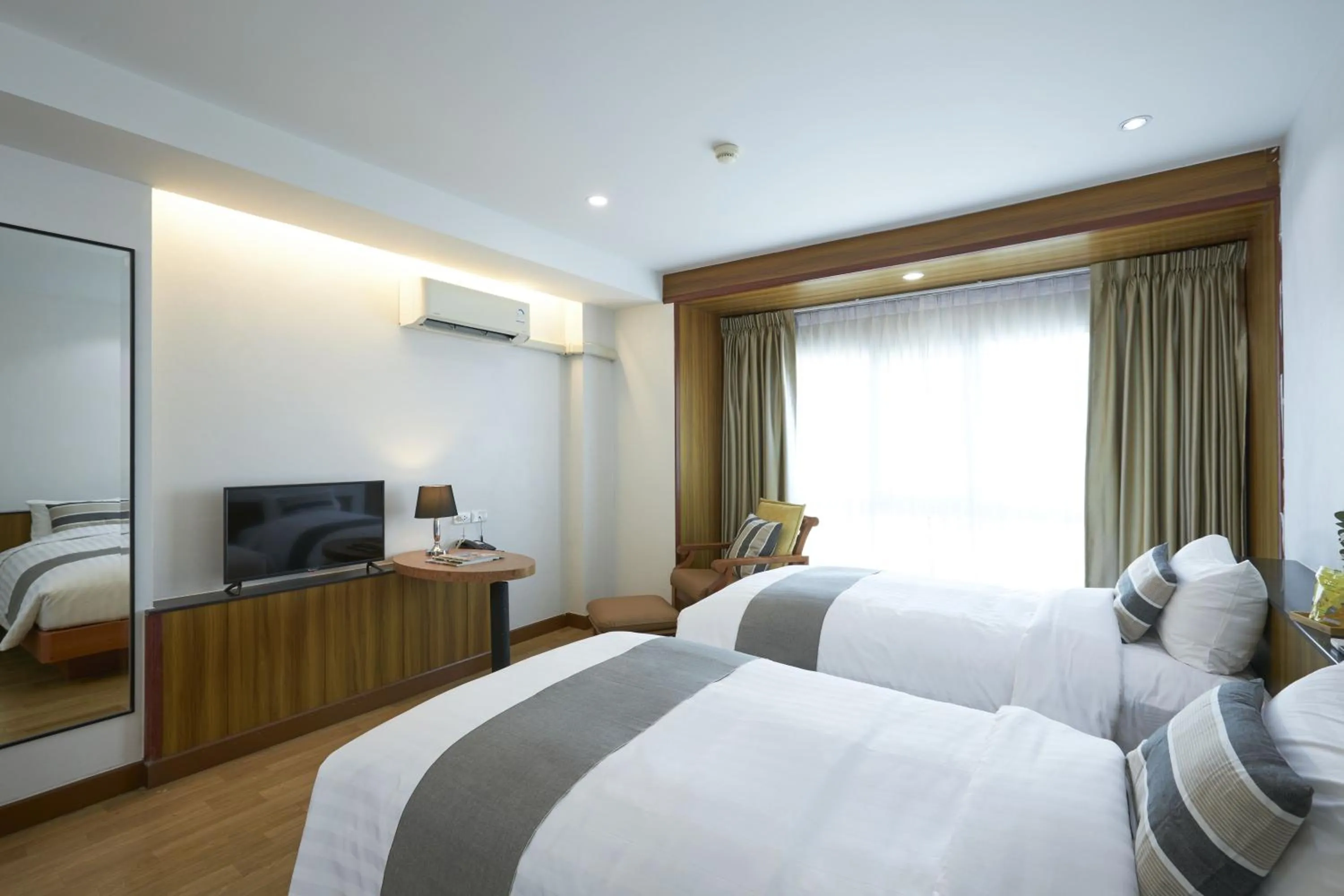 Bedroom in NJOY Prestige Grand Hotel Don Mueang