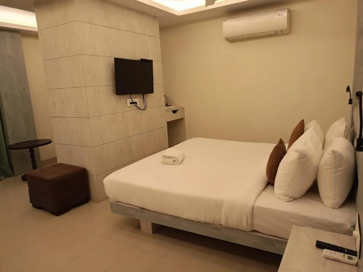 Photo of the whole room, Bed in Hotel Rishiraj, Nagaon