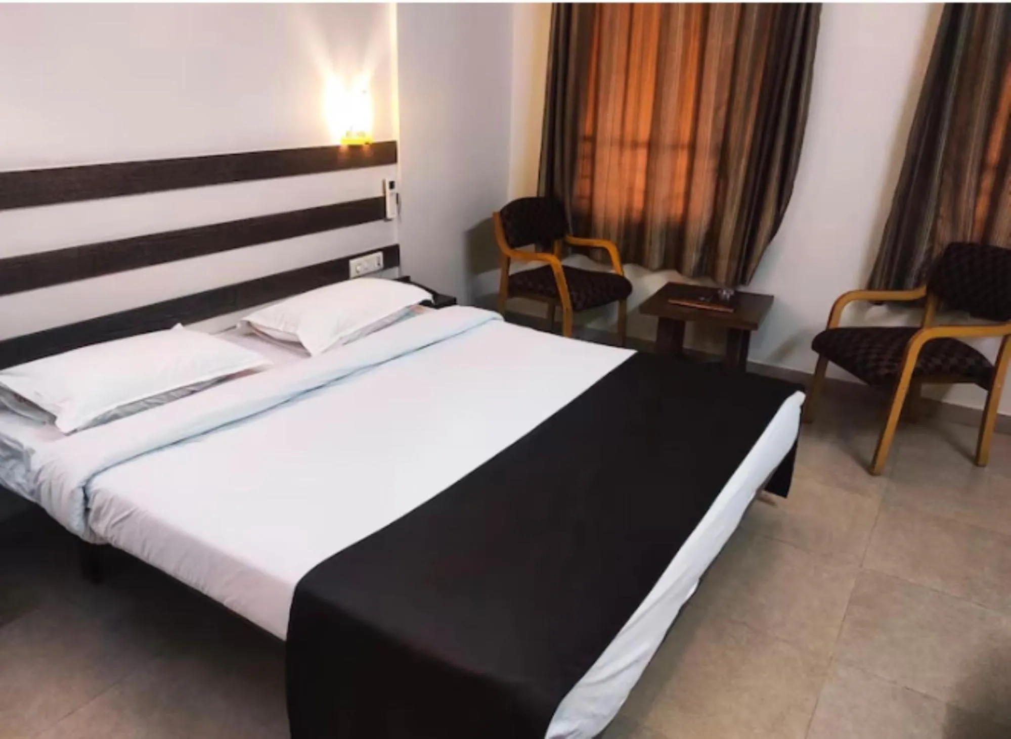 Bed in Hotel Orient Crown, Kolhapur