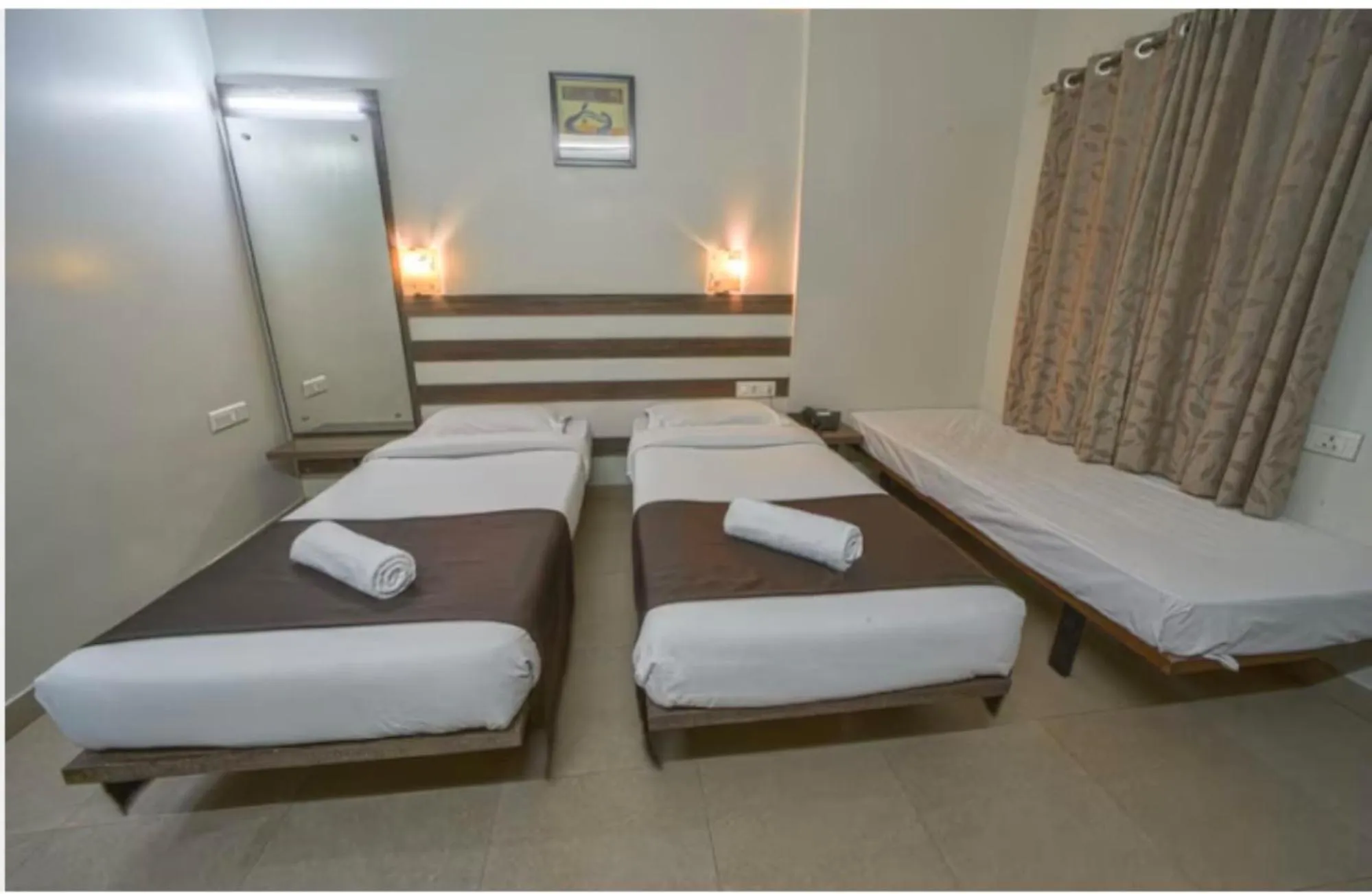 Bed in Hotel Orient Crown, Kolhapur