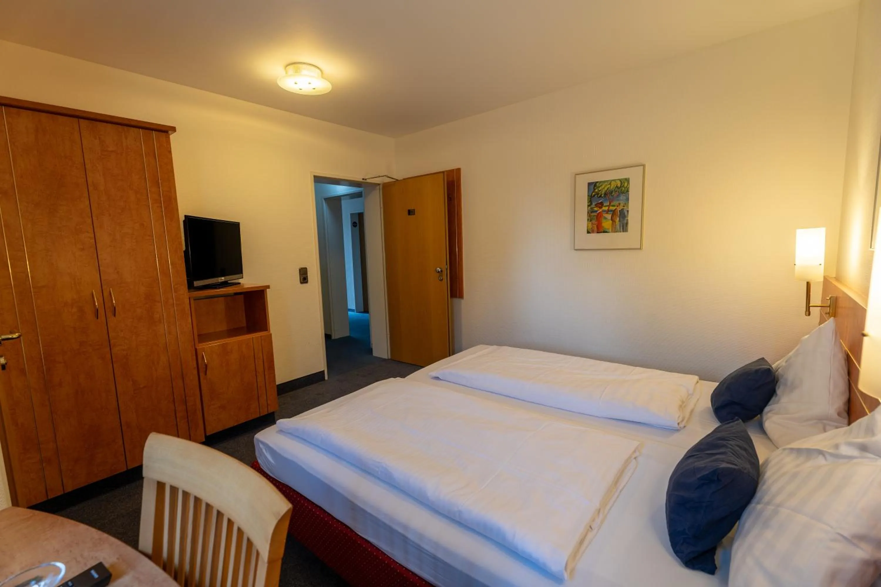 Photo of the whole room, Bed in Airport Business Hotel Köln