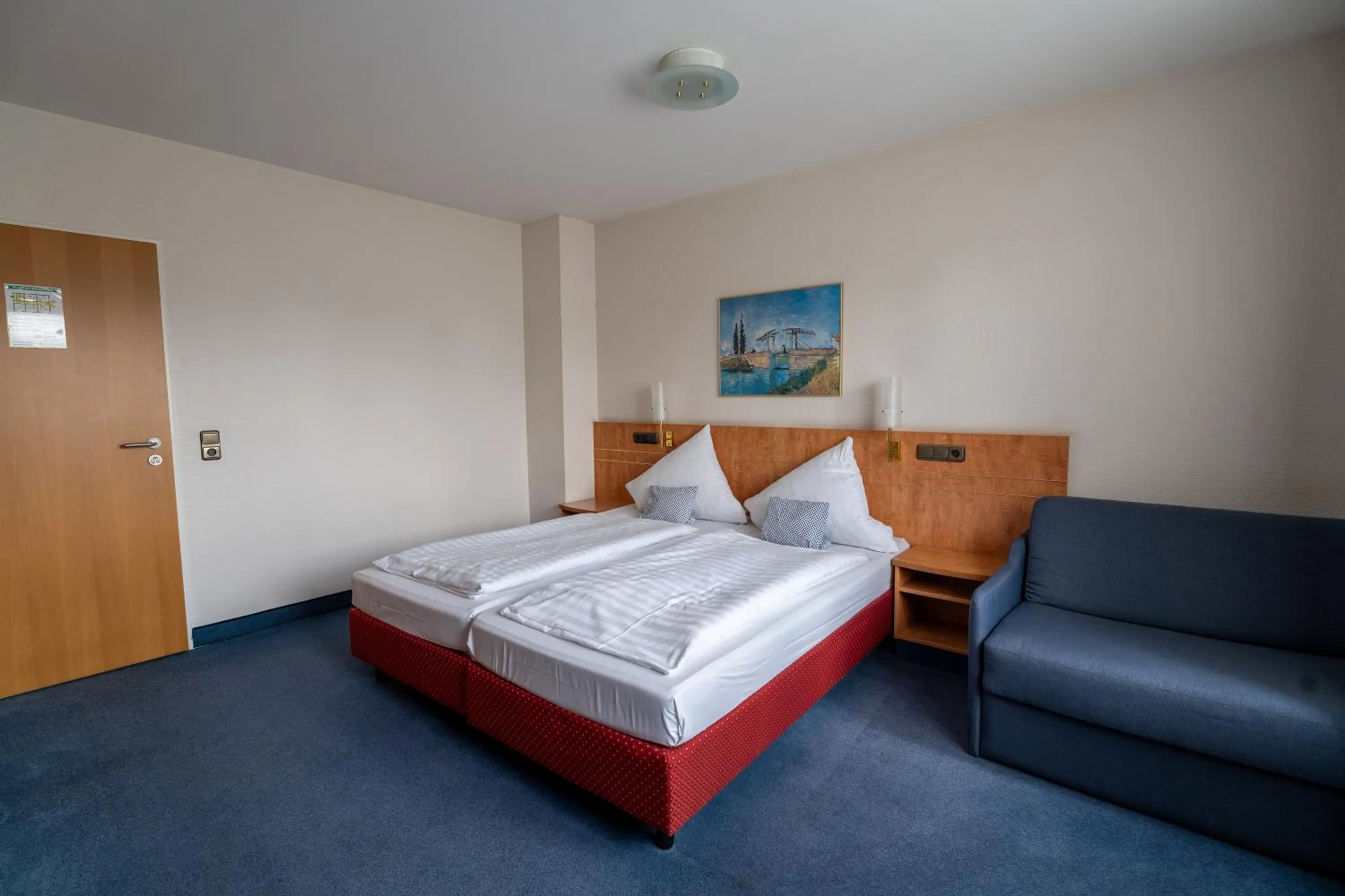 Bed in Airport Business Hotel Köln