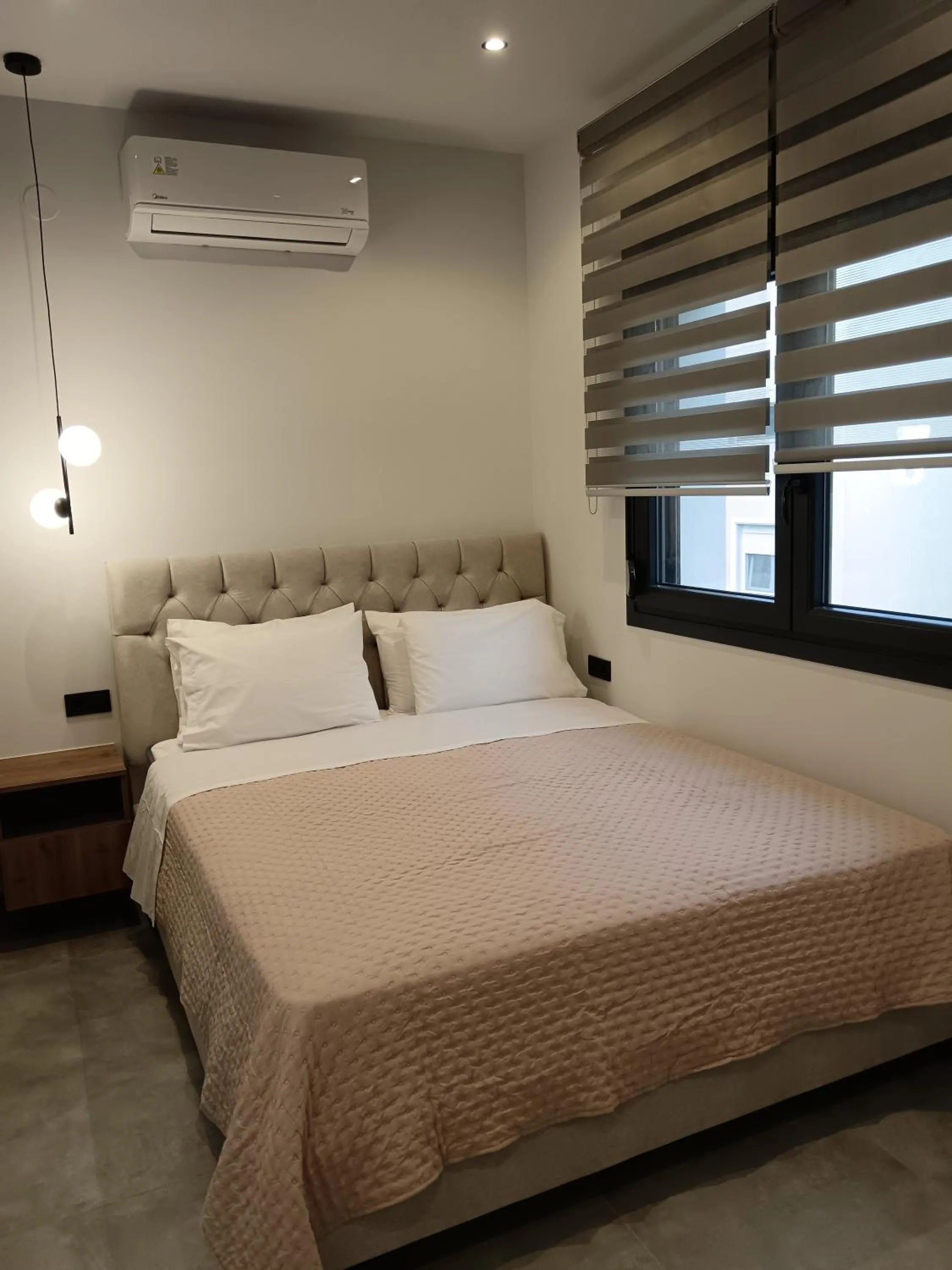 Bed in Dunes Luxury Apartments