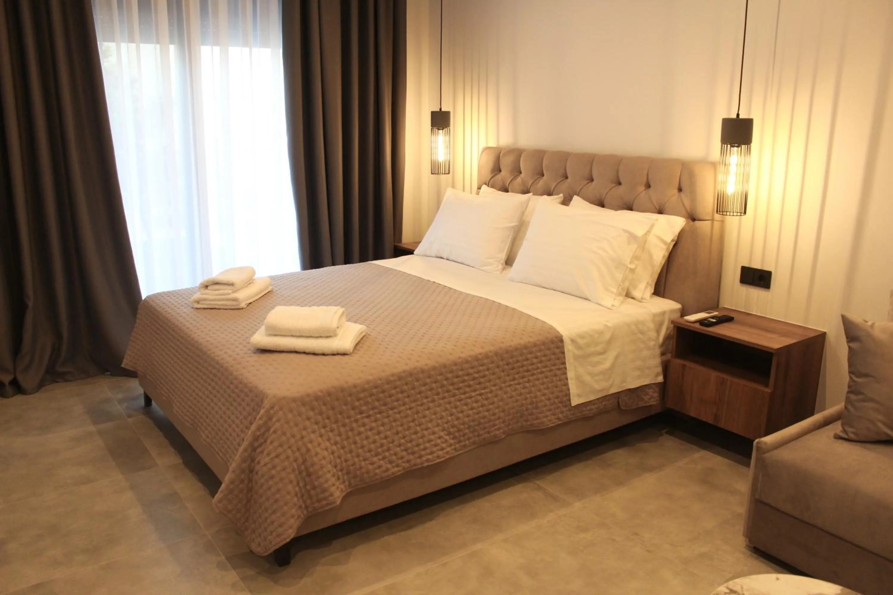 Bed in Dunes Luxury Apartments