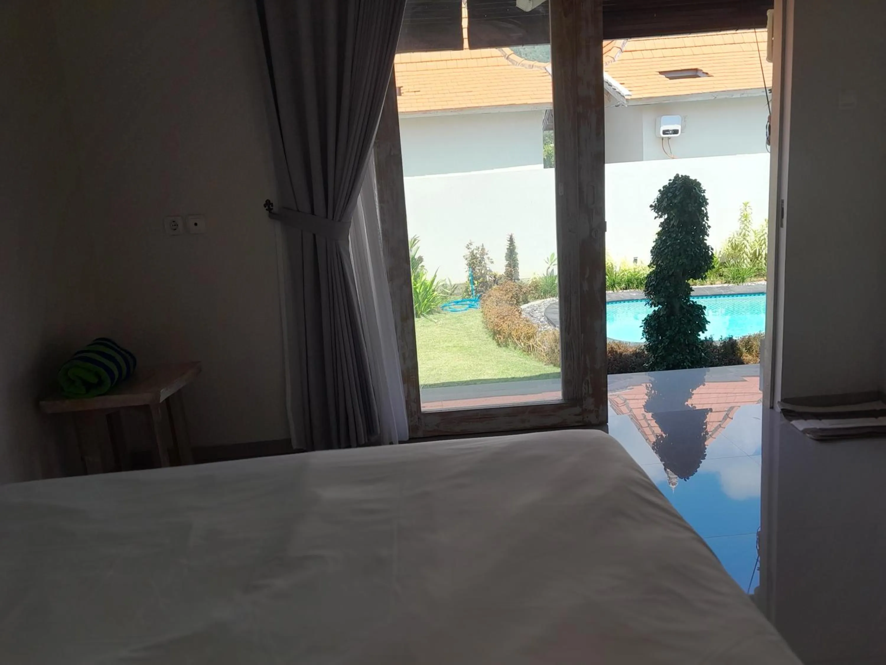 Bed in Maha Rama Villas Amed