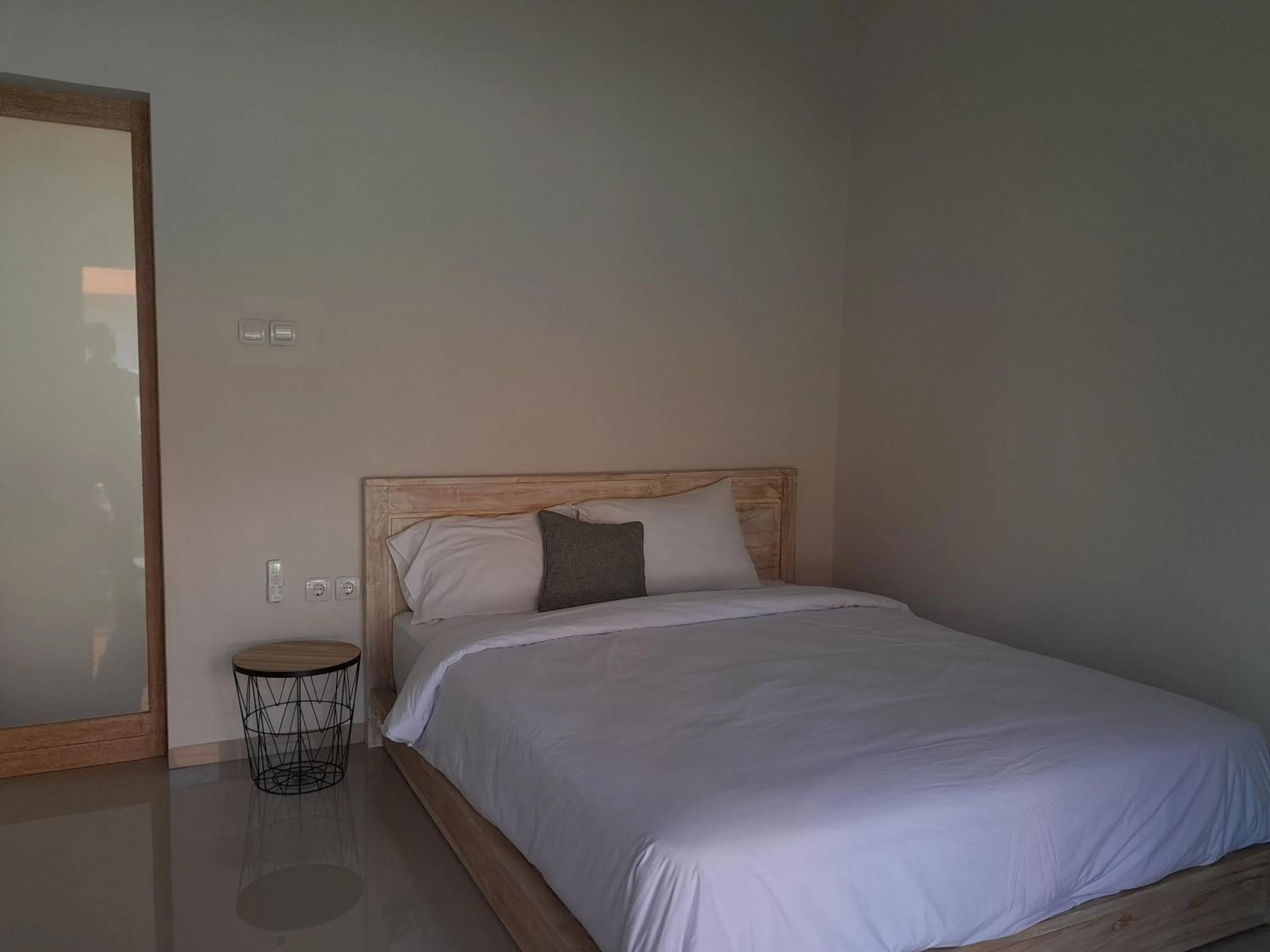 Bed in Maha Rama Villas Amed