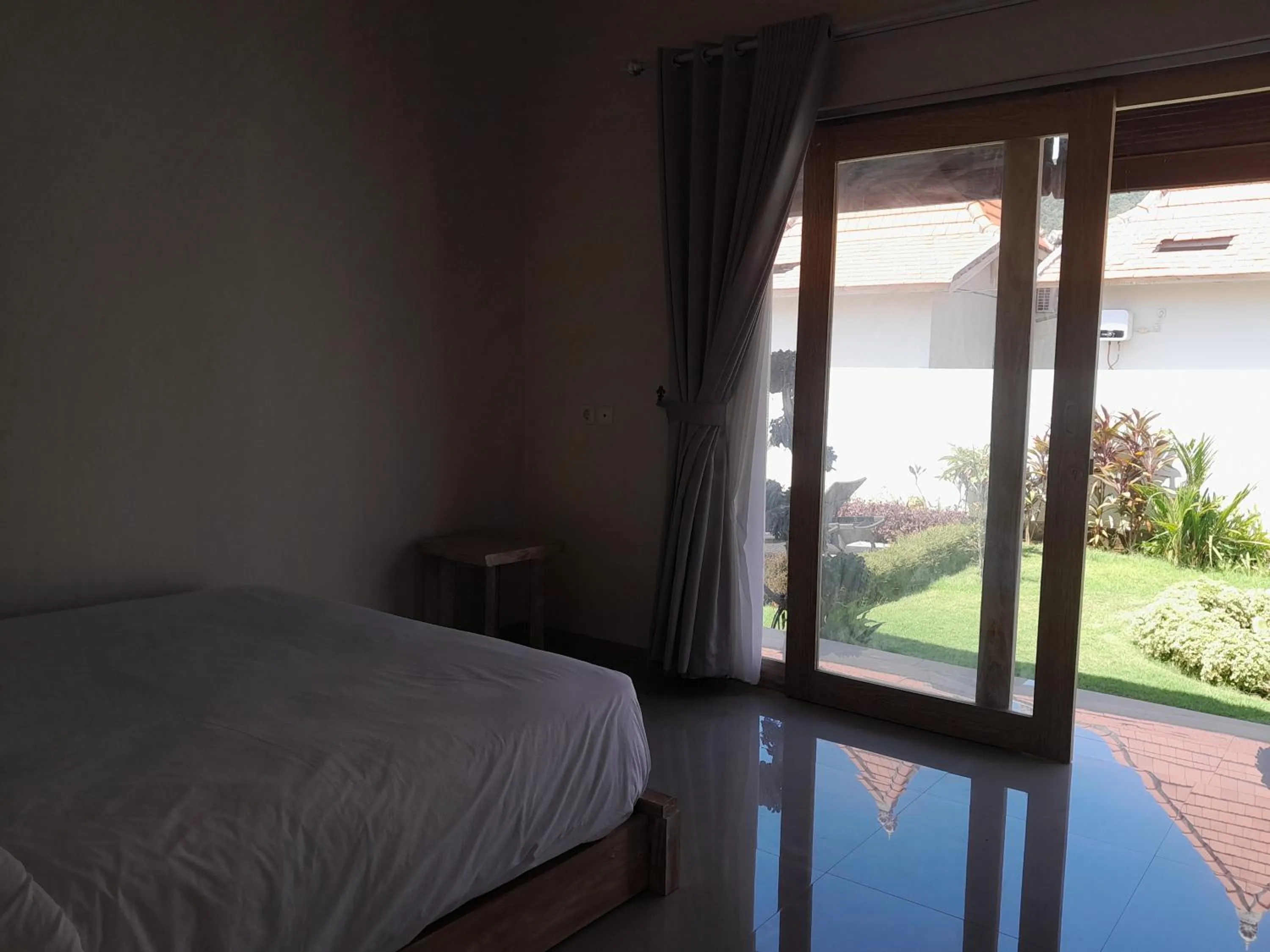 Bed in Maha Rama Villas Amed