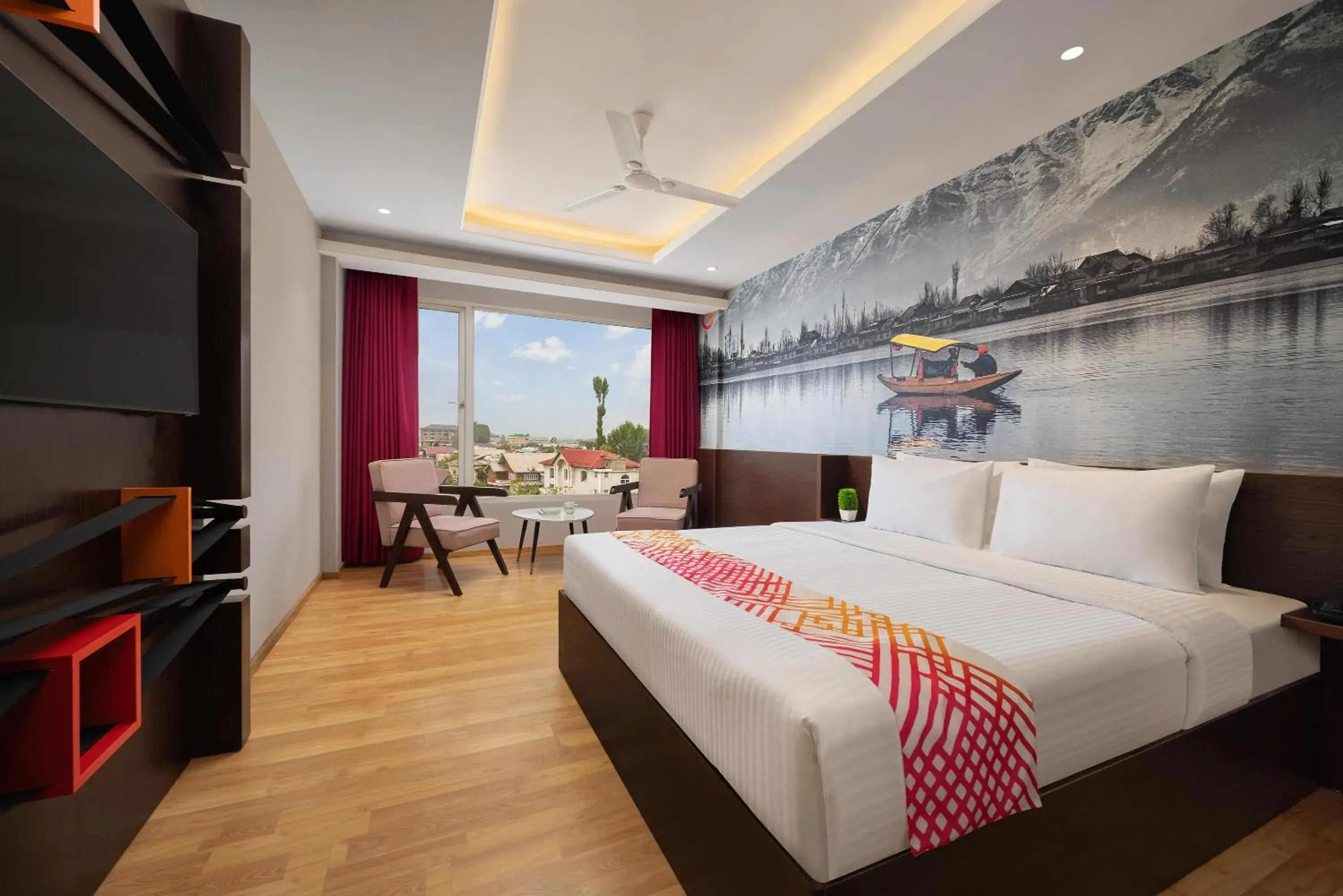 Communal lounge/ TV room, Bed in Ginger Srinagar Barzulla Near Srinagar Airport Communal lounge/ TV room, Bed in Ginger Srinagar Barzulla Near Srinagar Airport