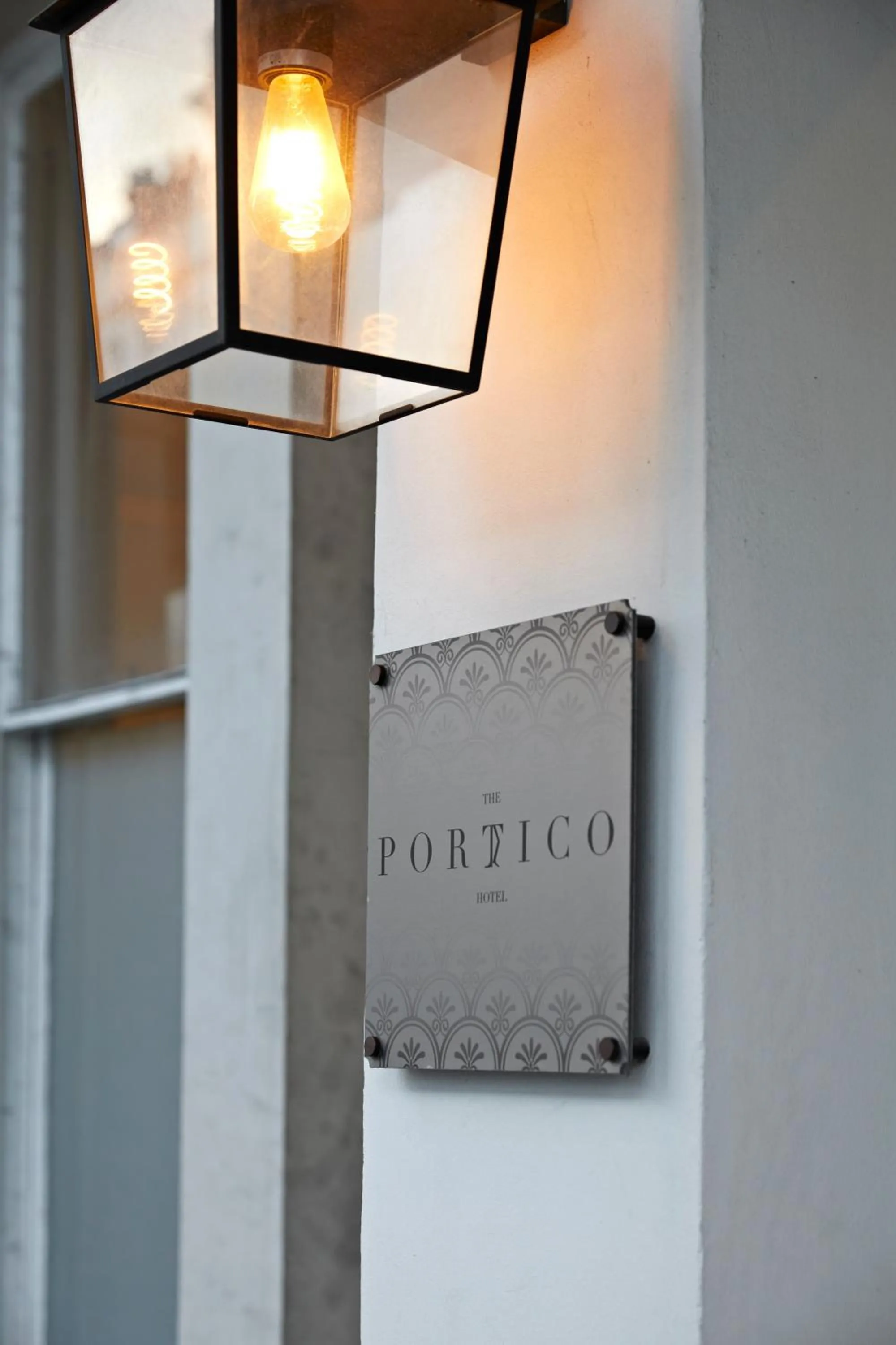 Property logo or sign in The Portico Hotel