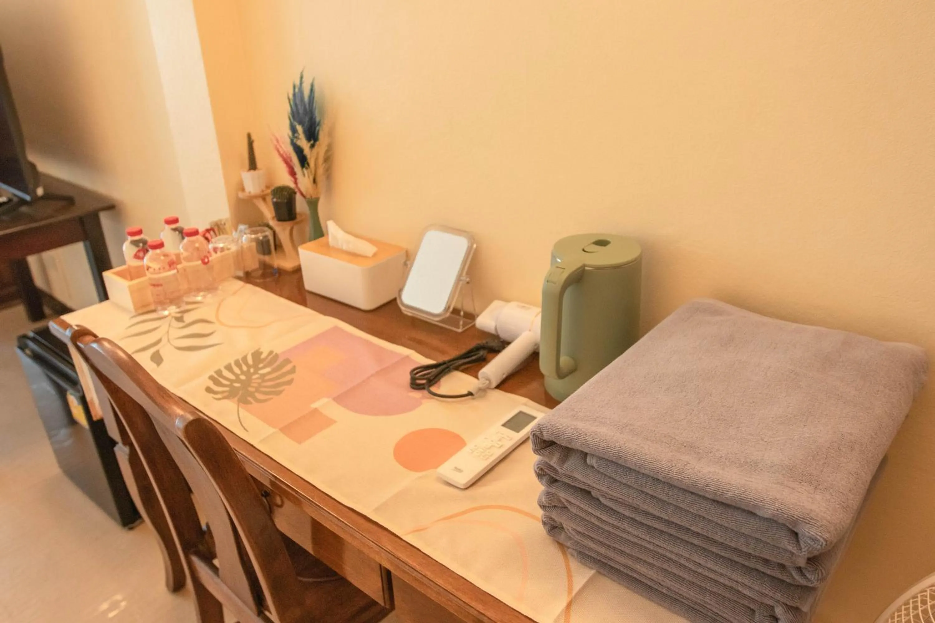 towels in Maiiam Guesthouse Patong