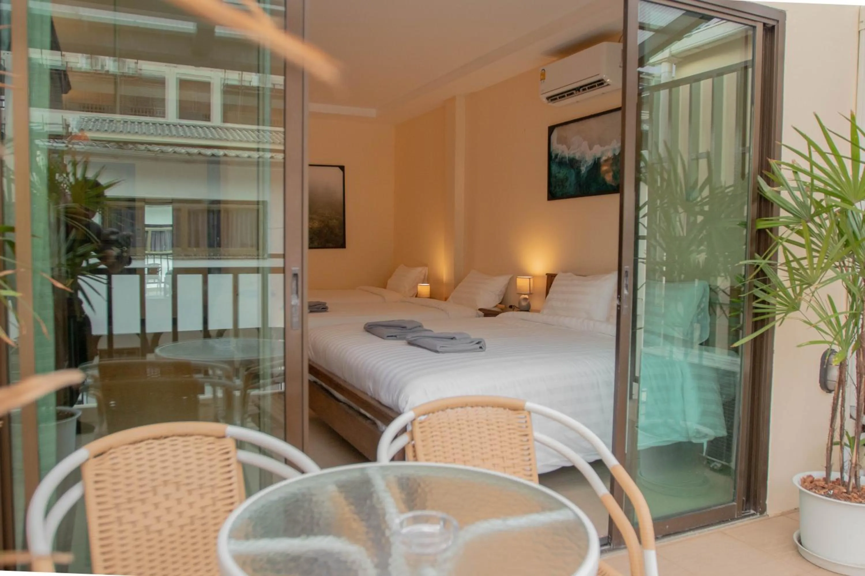 Balcony/Terrace, Bed in Maiiam Guesthouse Patong