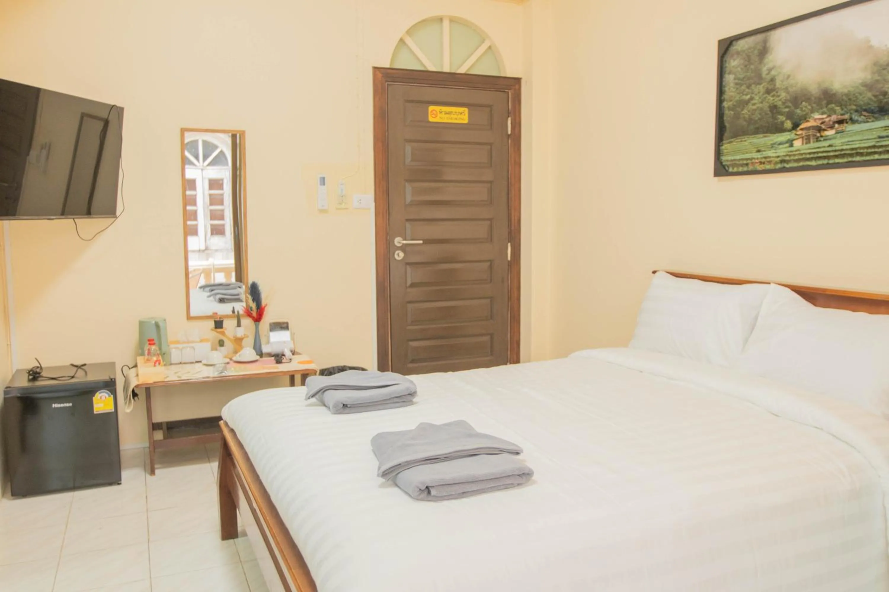 Bed in Maiiam Guesthouse Patong