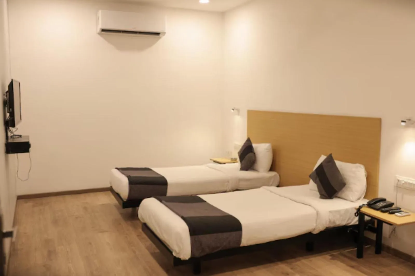 Photo of the whole room, Bed in Hotel Signature, Nagpur