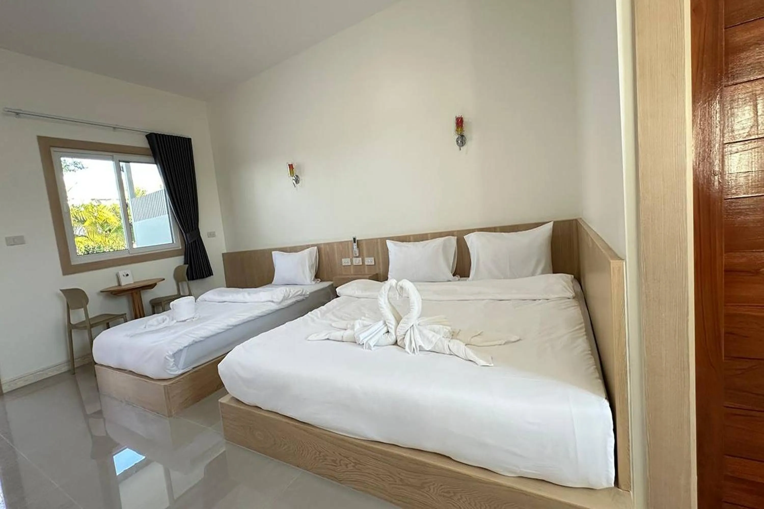 Bed in The White House P&N Hotel Chiang Rai