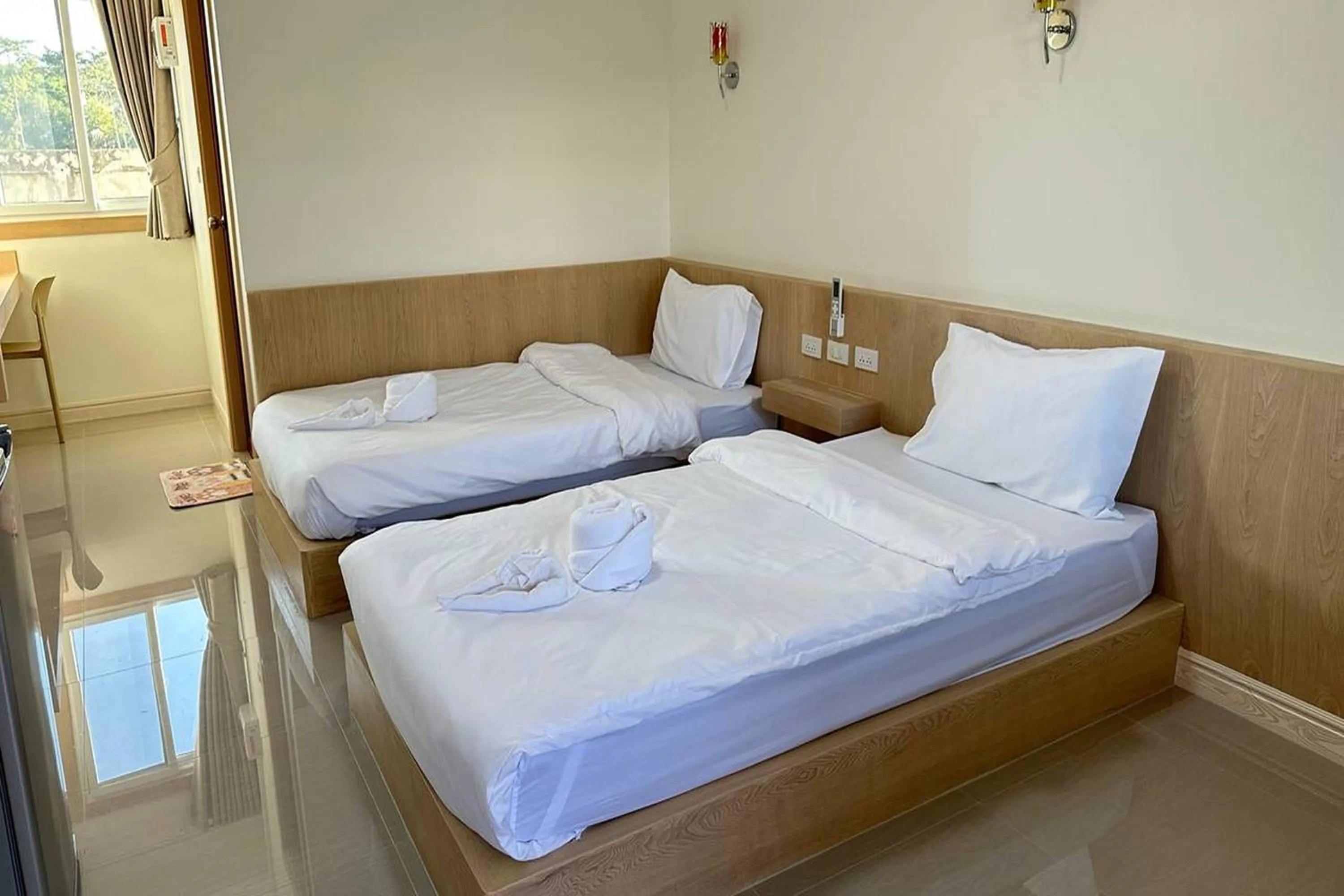 Bed in The White House P&N Hotel Chiang Rai