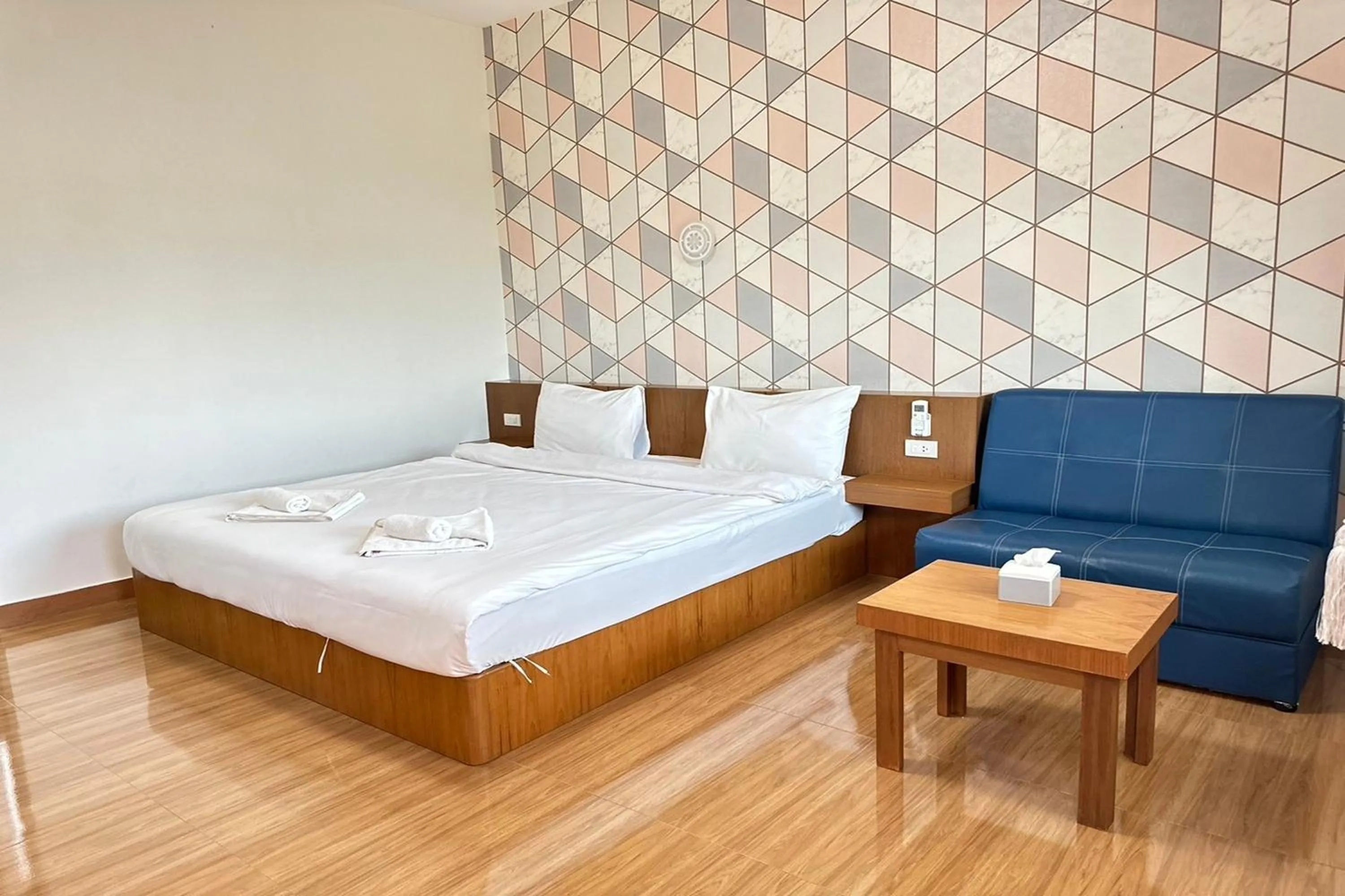 Bed in The White House P&N Hotel Chiang Rai