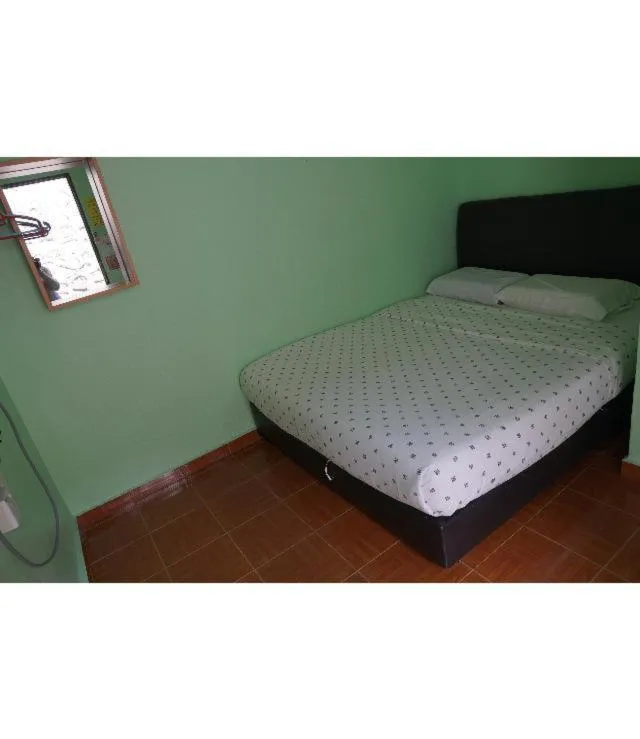 Bed in ACF Guest House