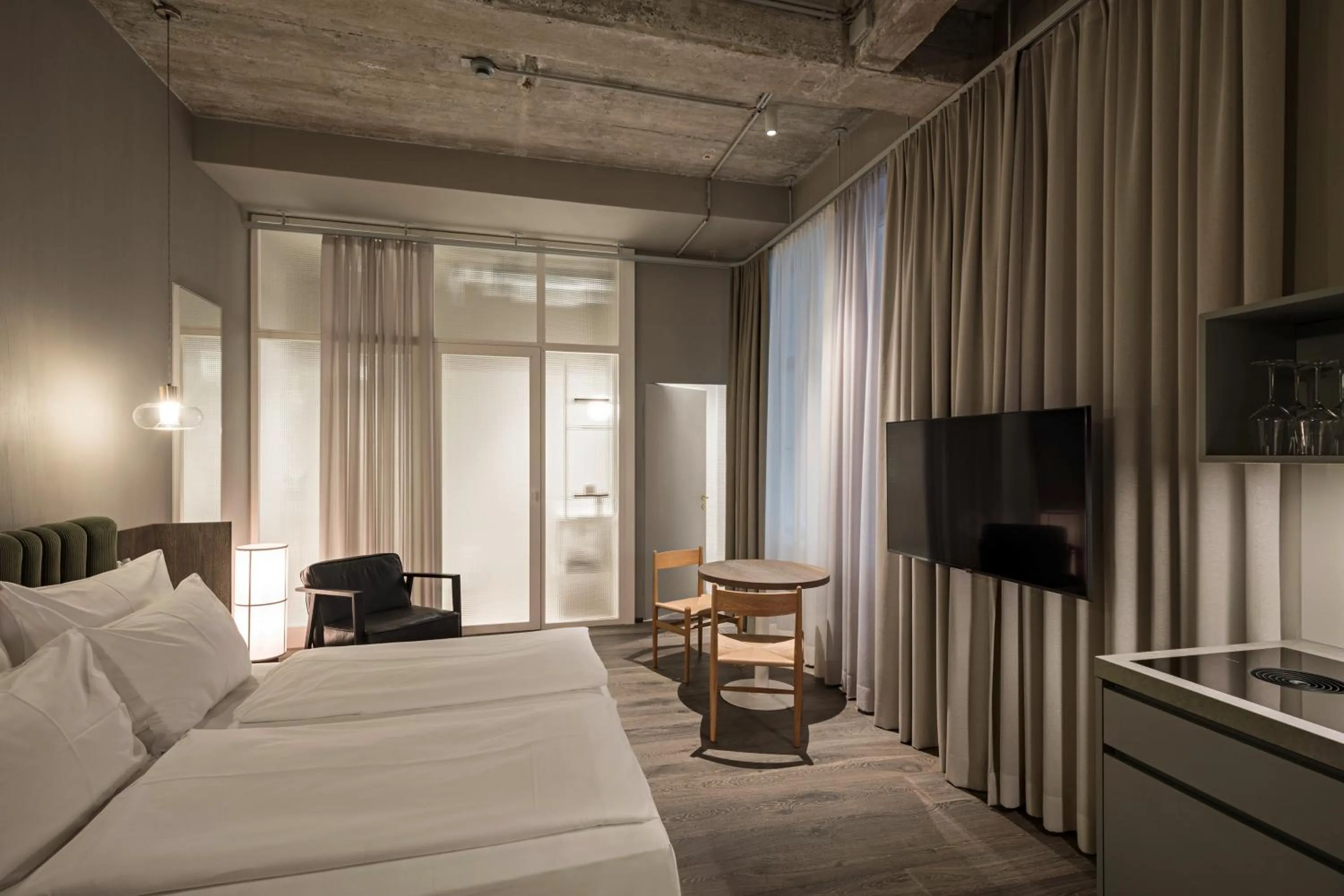 Bed in Rooms by Wolfensson - Boutique Hotel