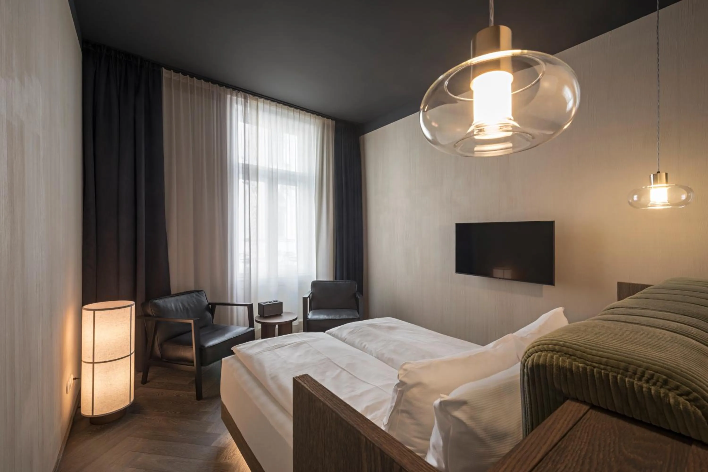 TV and multimedia, Bed in Rooms by Wolfensson - Boutique Hotel