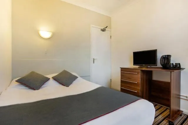 Bedroom, Bed in Enrico Hotel