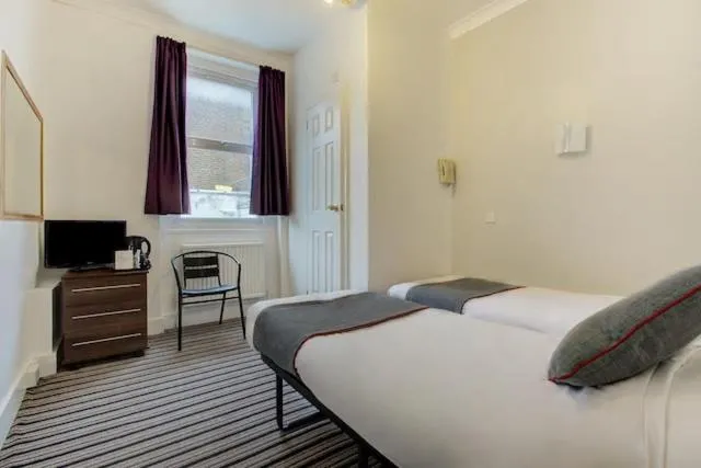 Bedroom, Bed in Enrico Hotel