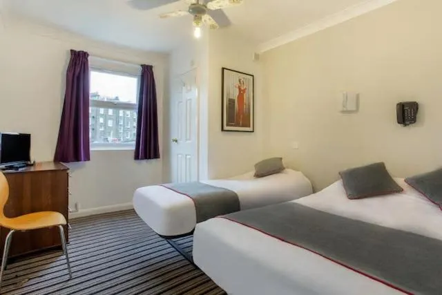 Bedroom, Bed in Enrico Hotel