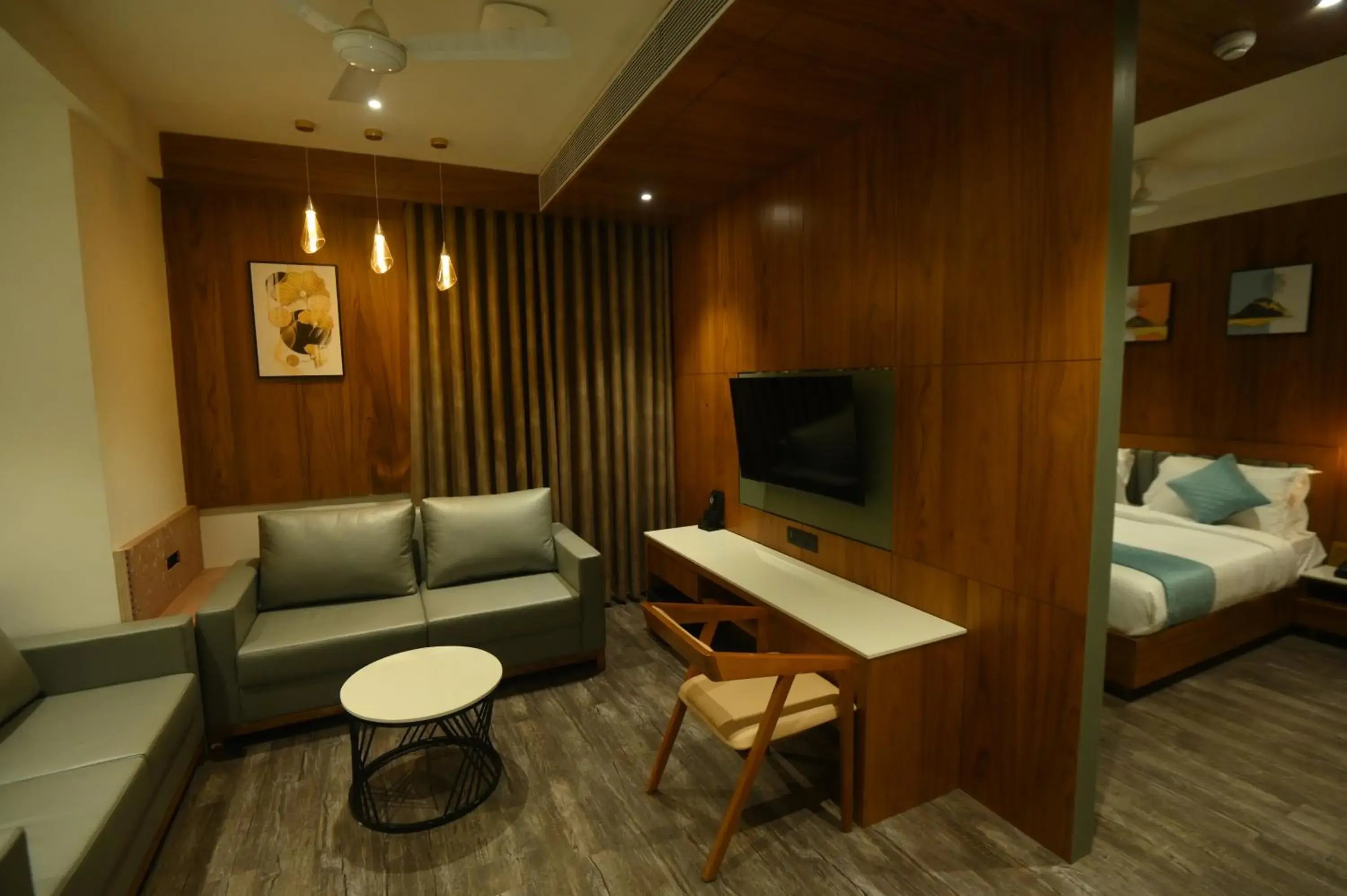 Living room, Bed in Kings Kraft Tremezzo Inn, Somnath Living room, Bed in Kings Kraft Tremezzo Inn, Somnath