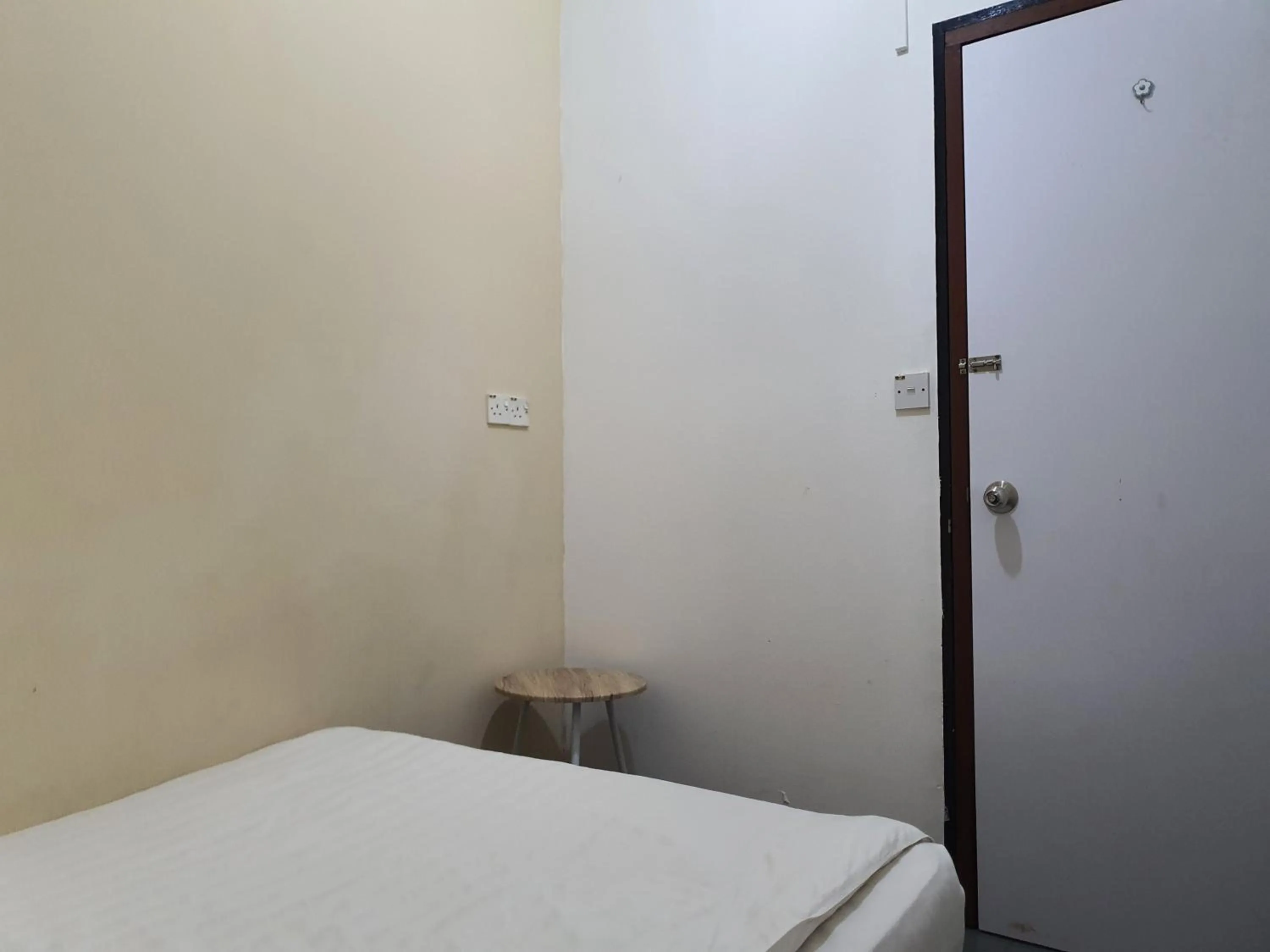 Bedroom in SPOT ON 90984 Gn Homestay